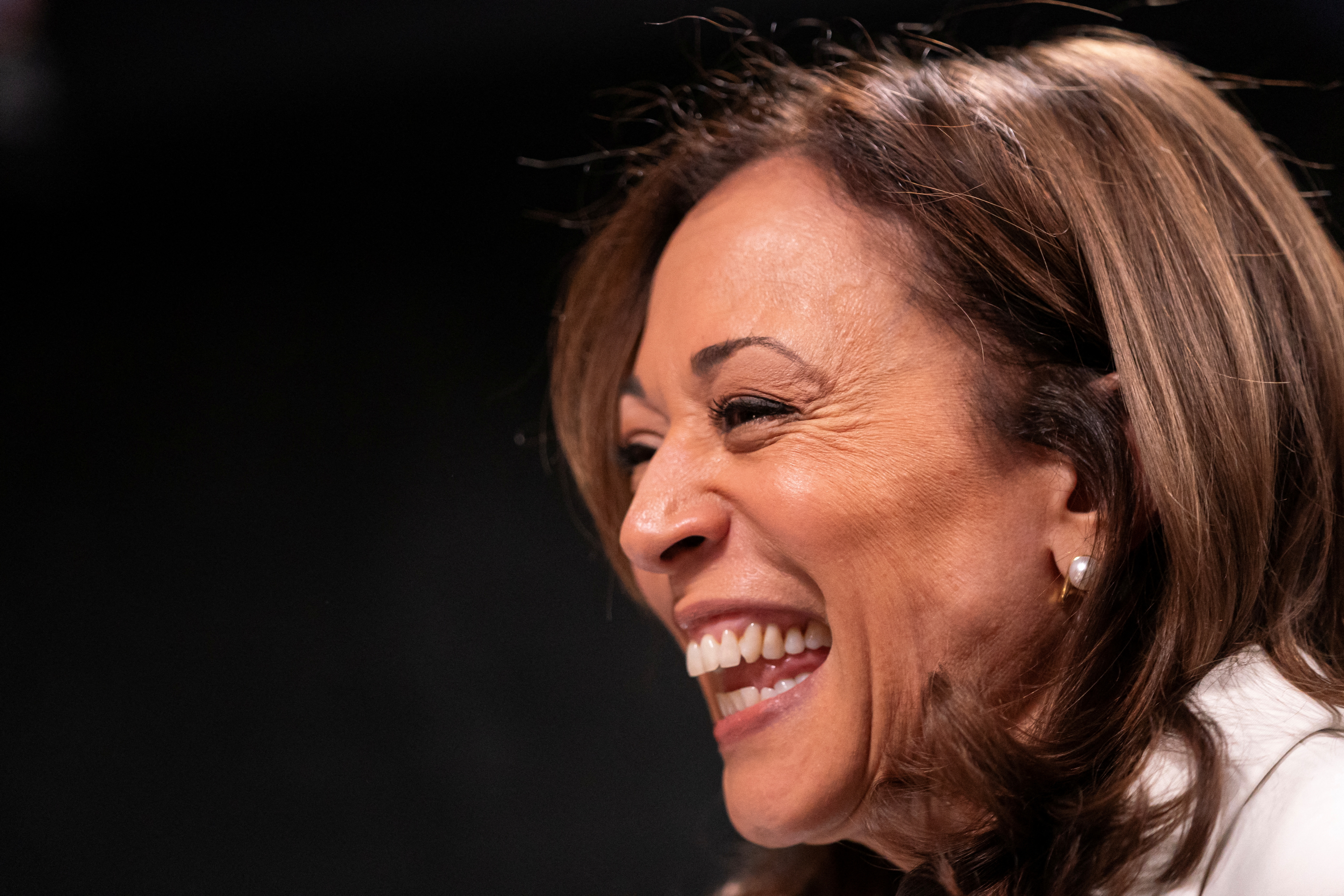 Vice President Kamala Harris attends the opening of a pop-up ice cream shop "Smize &amp; Dream" owned by Tyra Banks, in Washington, U.S., July 19, 2024. Nathan Howard/Pool via REUTERS