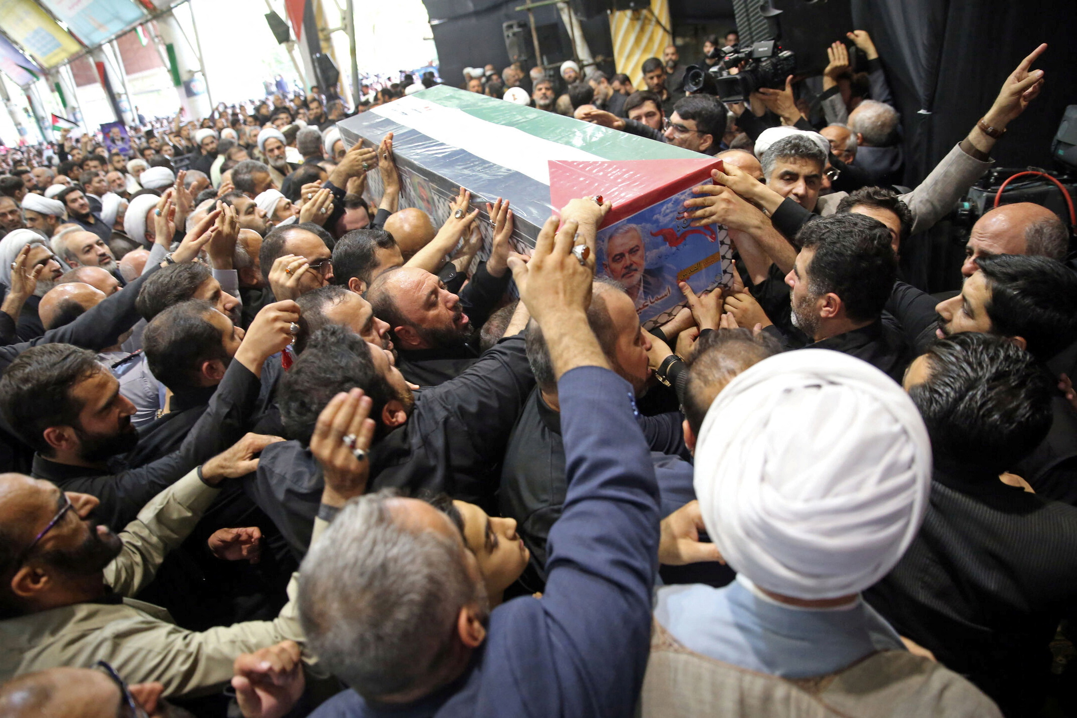 Mourners carry the coffin of assassinated Hamas political chief, Ismail Haniyeh, during his funeral ceremony in Tehran, Iran, August 1, 2024. [Office of the Iranian Supreme Leader/WANA via Reuters]