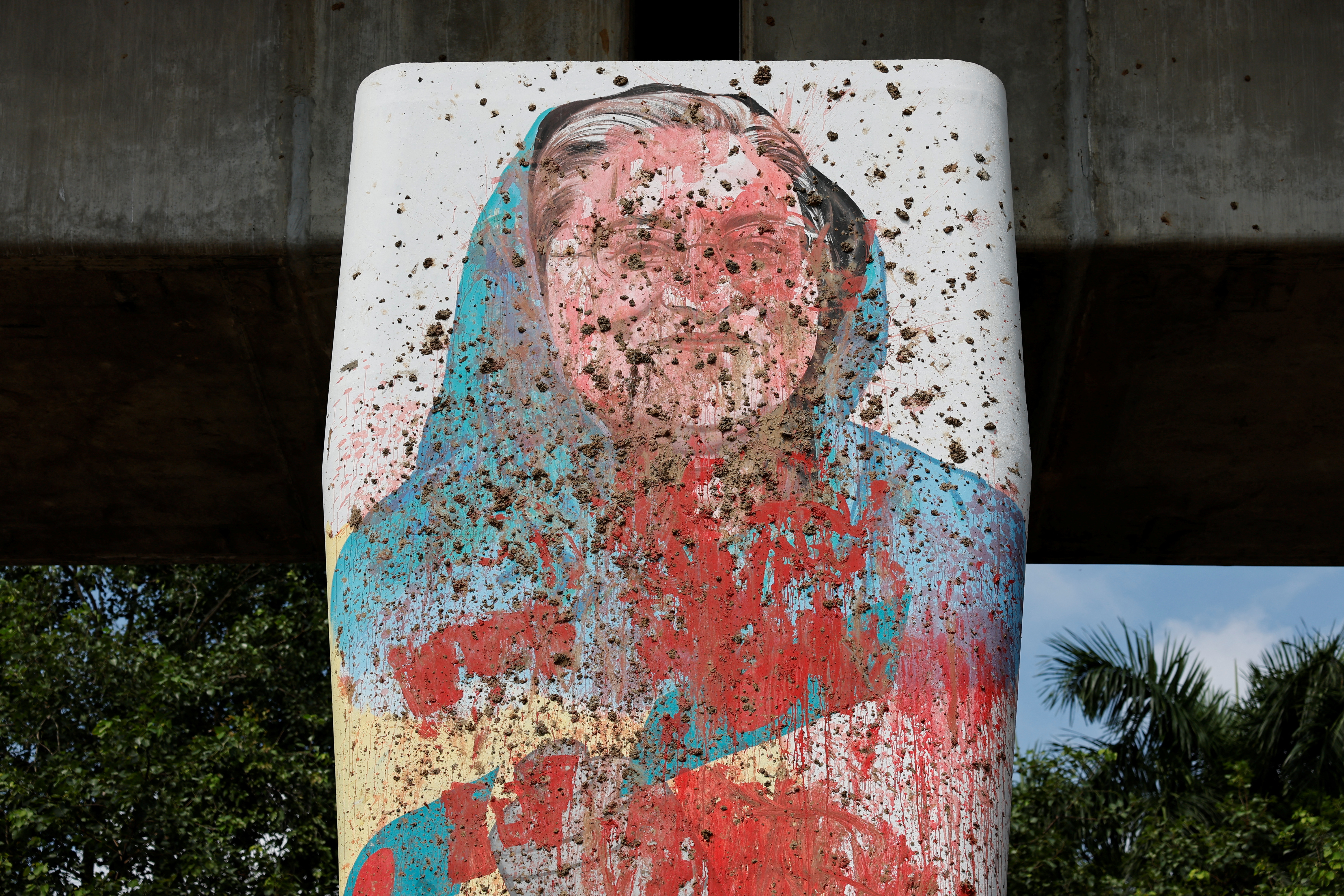 A mural of Bangladeshi Ex Prime Minister Sheikh Hasina is seen vandalised by protesters days before in Dhaka