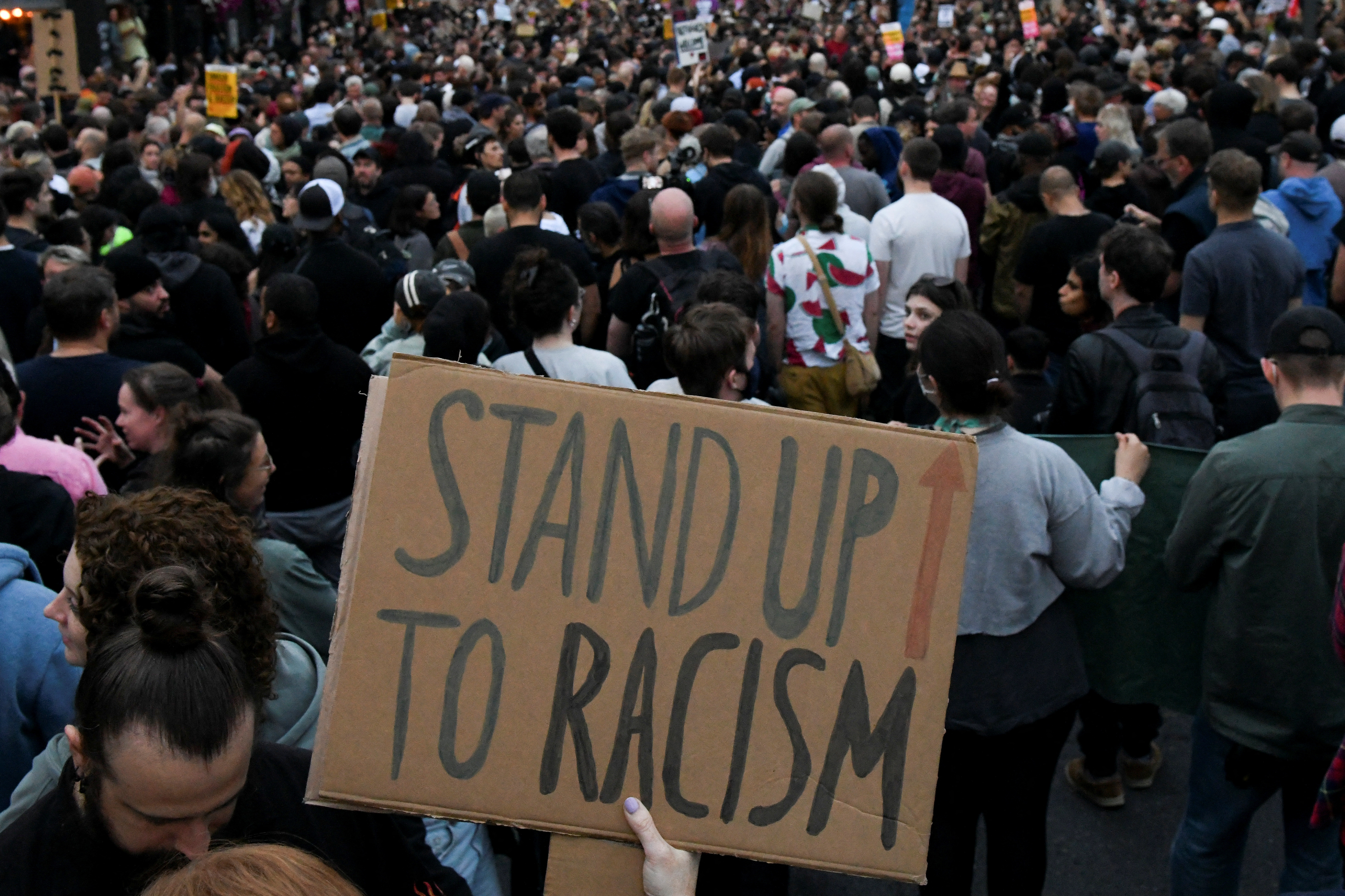 People gather against an an anti-immigration protest, in London, Britain, August 7, 2024. REUTERS/Chris J Ratcliffe