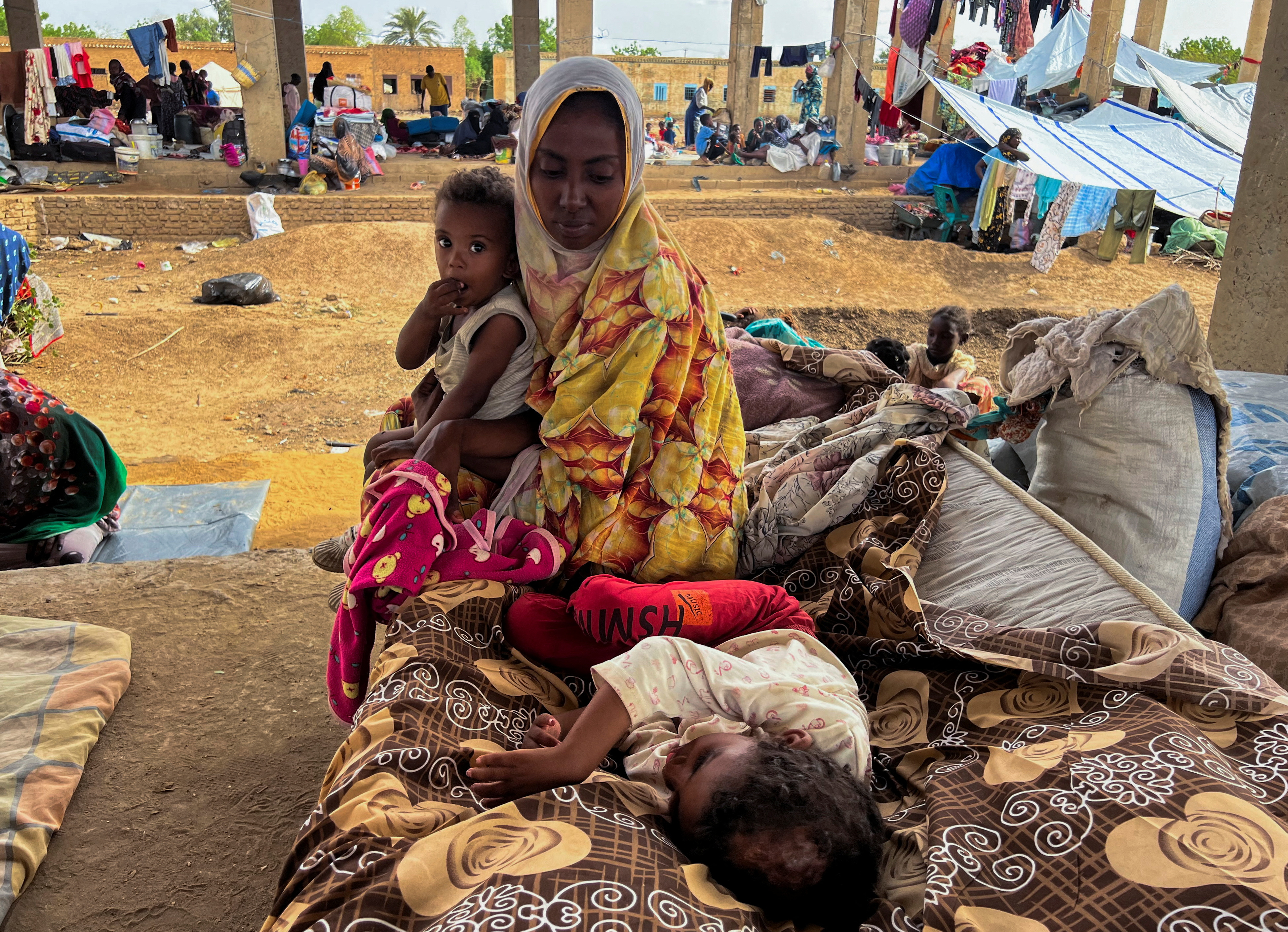 Families displaced by RSF advances in Sudan's El Gezira and Sennar states shelter at the Omar ibn al-Khattab displacement site, Kassala state, Sudan, July 10, 2024. REUTERS/ Faiz Abubakr
