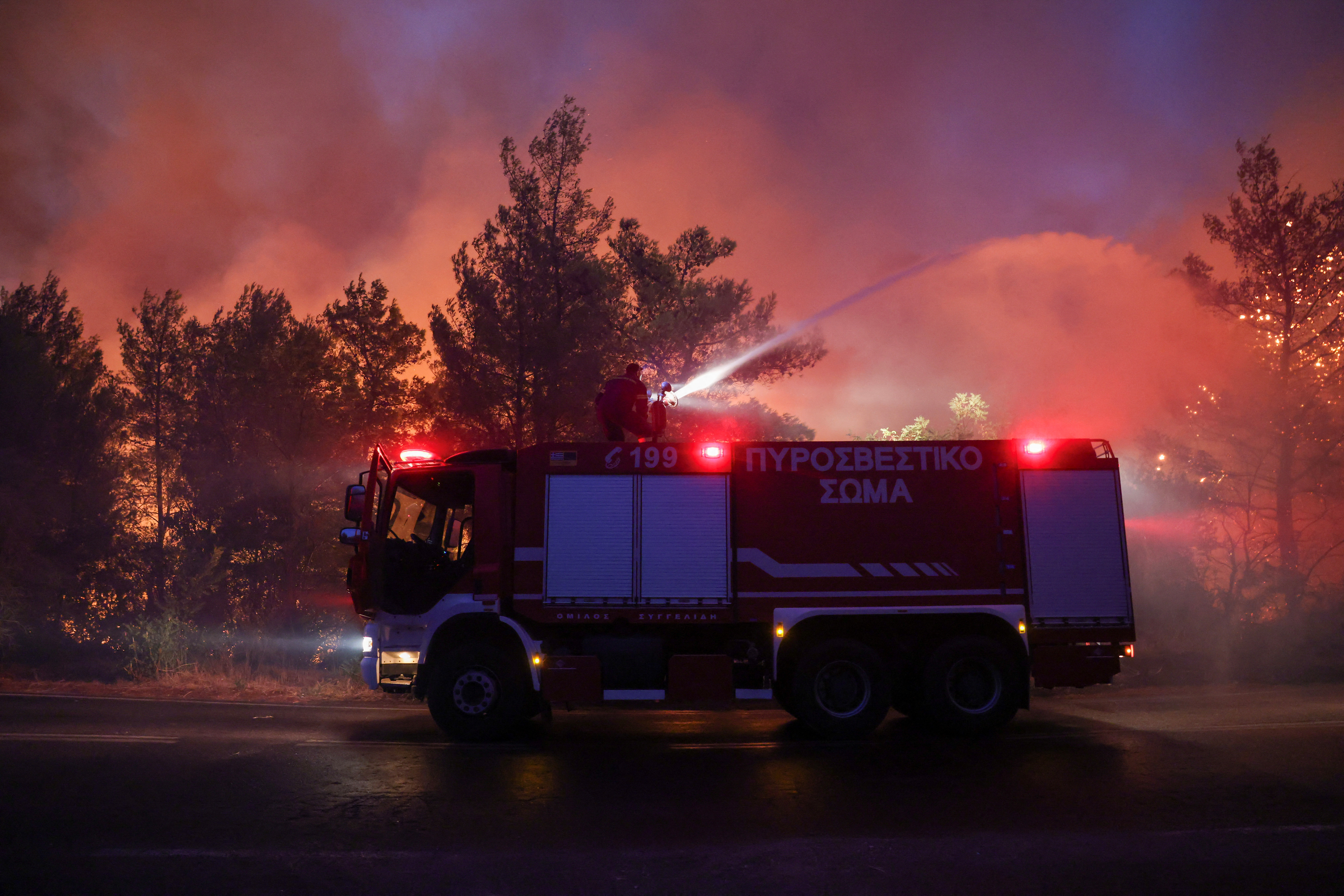Major wildfire rages out of control on fringes of Greek capital; hundreds of firefighters deployed