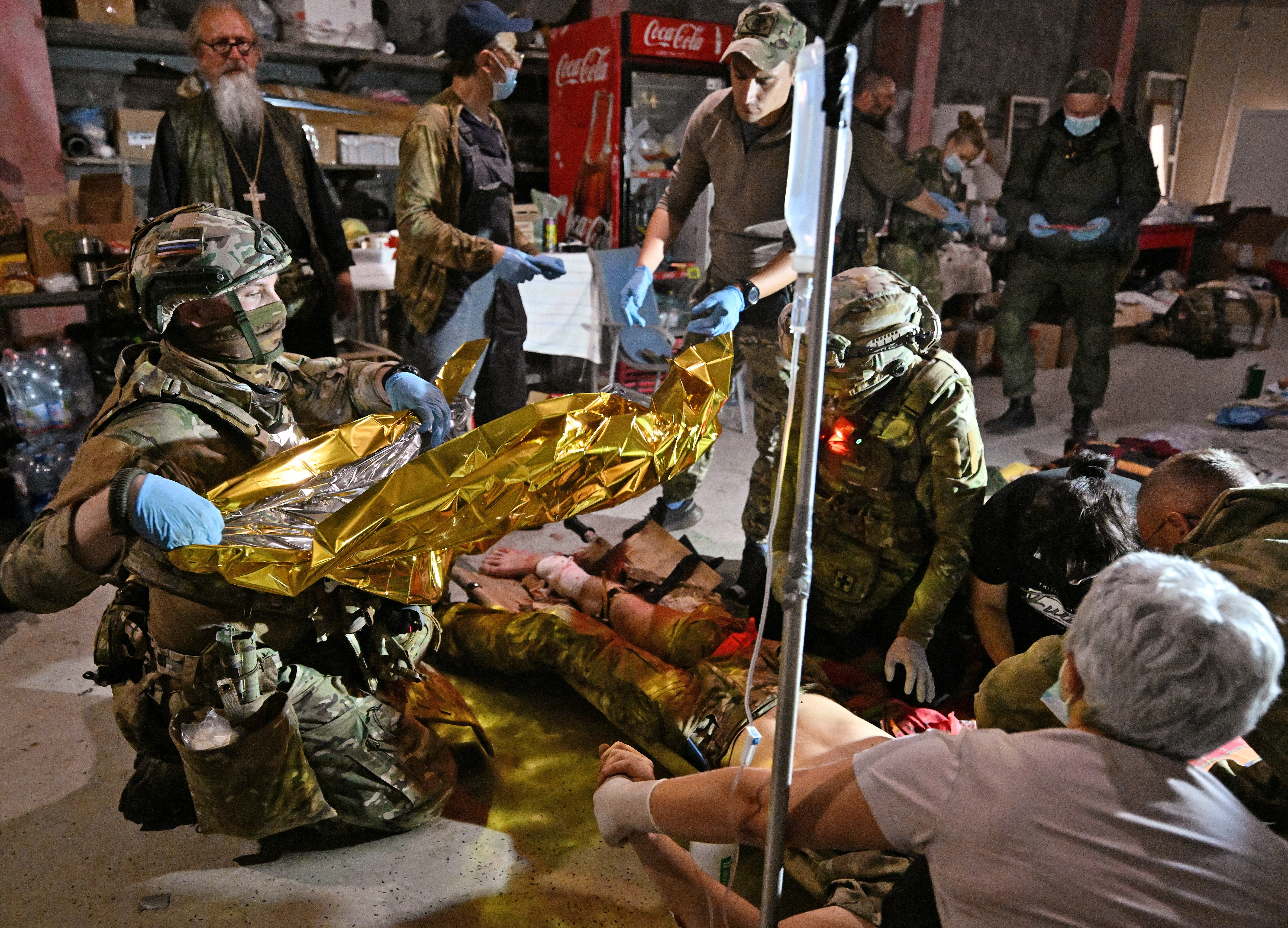 Medics deliver medical aid at a mobile medical station