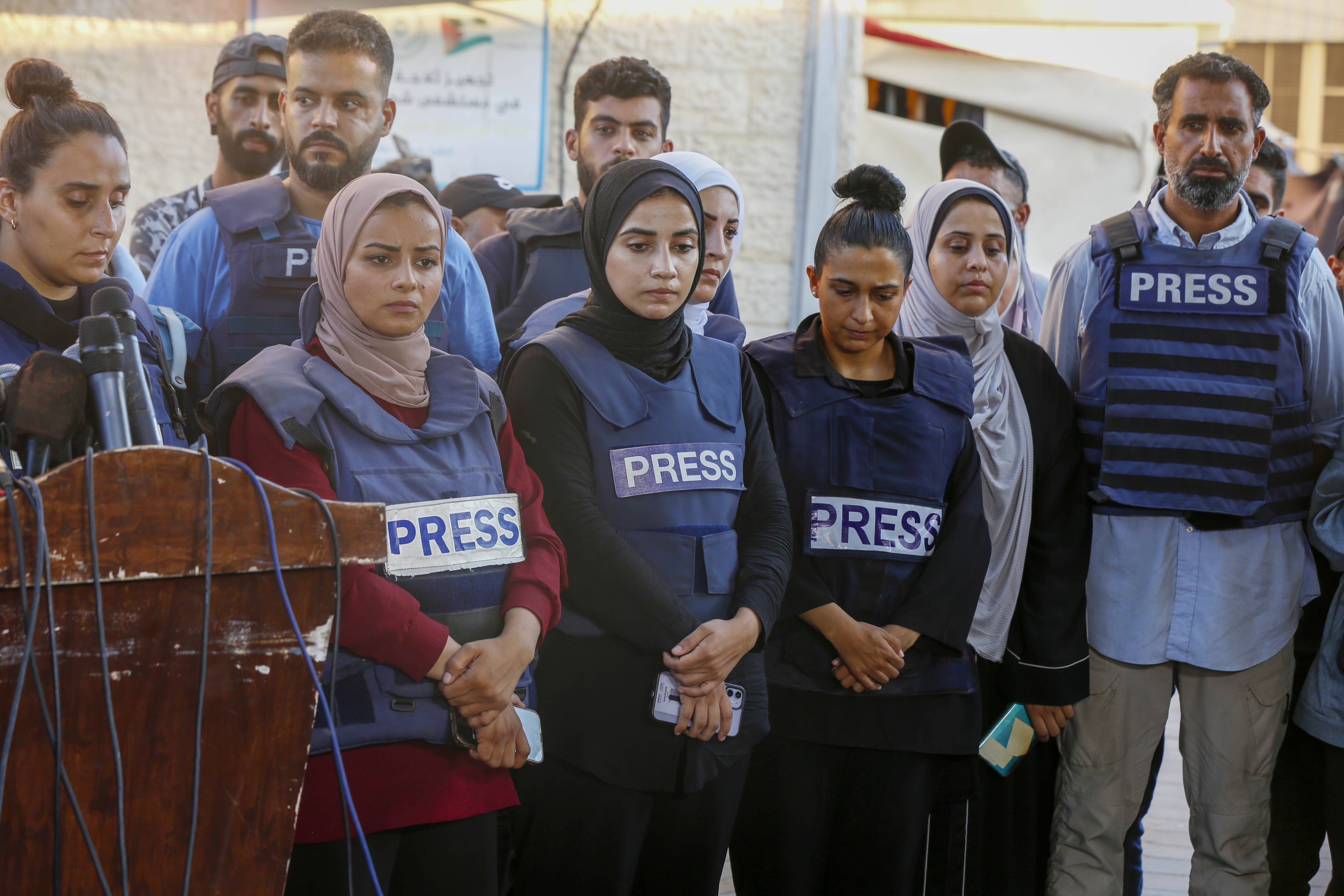 DEIR AL-BALAH, GAZA - JULY 31: The journalists gather in front of Al-Aqsa Martyrs Hospital to commemorate their friends Al Jazeera reporter Ismail al-Ghoul and cameraman Rami al-Rifi who lost their lives in Israeli army attack on a moving vehicle in the Al-Shati refugee camp, in Deir al-Balah, Gaza on July 31, 2024. ( Ashraf Amra - Anadolu Agency )