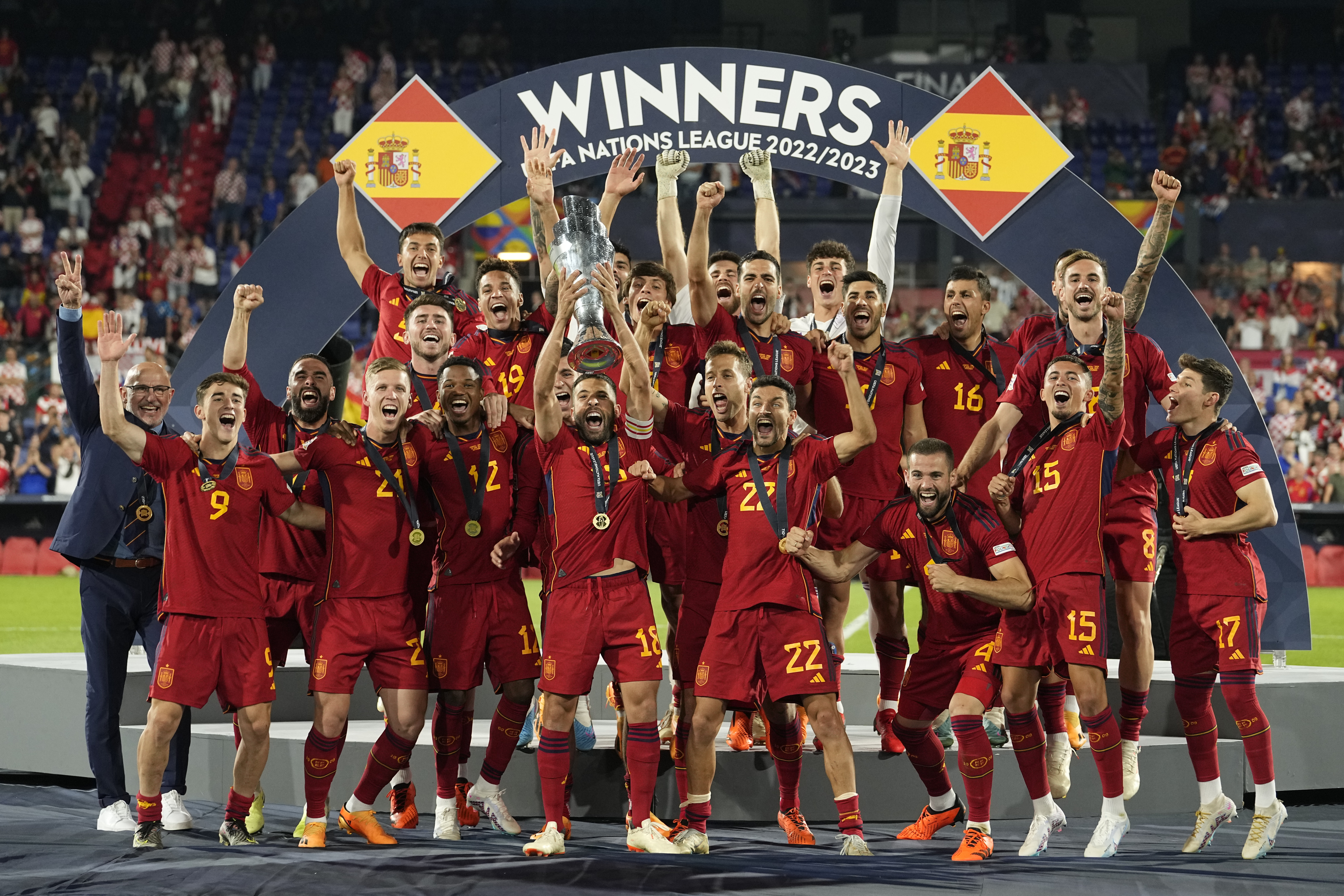 Spain players celebrate with the trophy after winning the Nations League final soccer match between Croatia and Spain at De Kuip stadium in Rotterdam, Netherlands, Sunday, June 18, 2023. (AP Photo/Martin Meissner)
