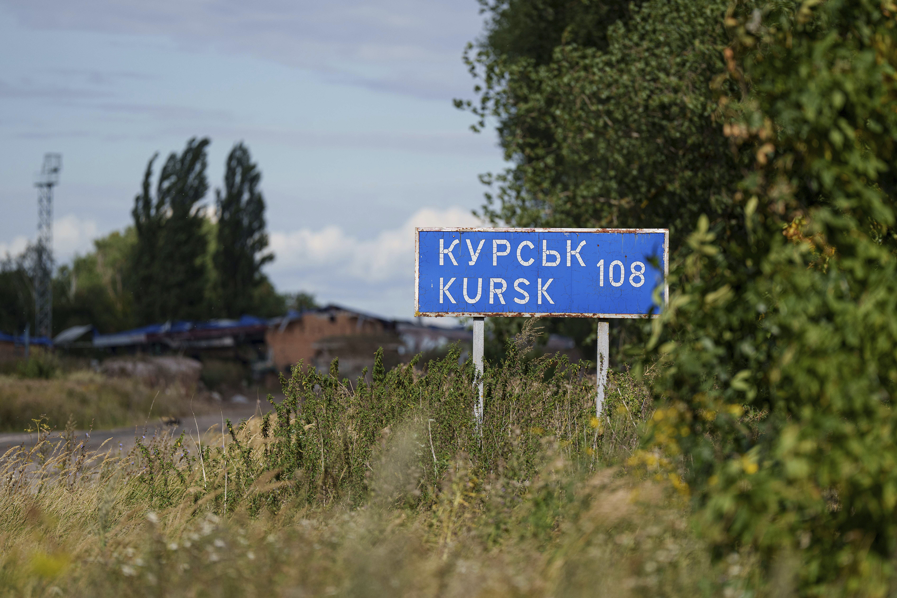 A plate with sign "Kursk 108 km" is seen on the Russian-Ukrainian border in Sumy region