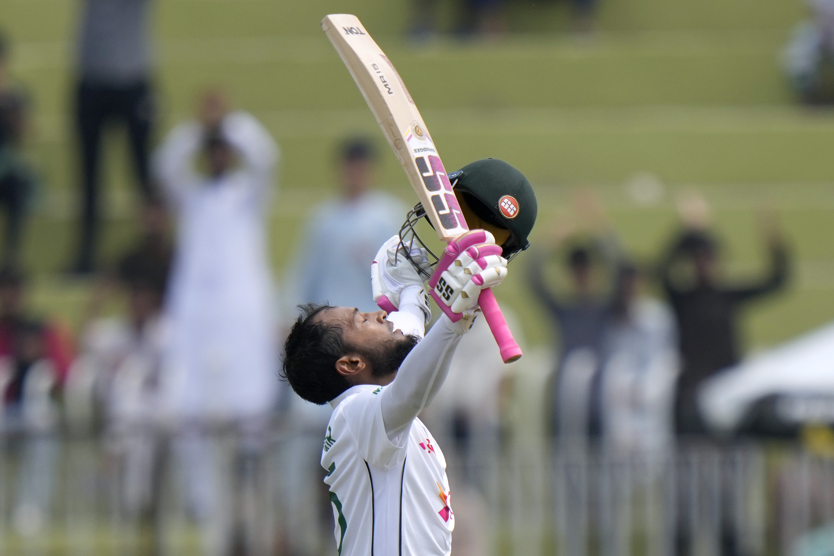 Bangladesh's Mushfiqur Rahim celebrates after scoring century during the fourth day of first cricket test match between Pakistan and Bangladesh, in Rawalpindi, Pakistan, Saturday, Aug. 24, 2024. (AP Photo/Anjum Naveed)