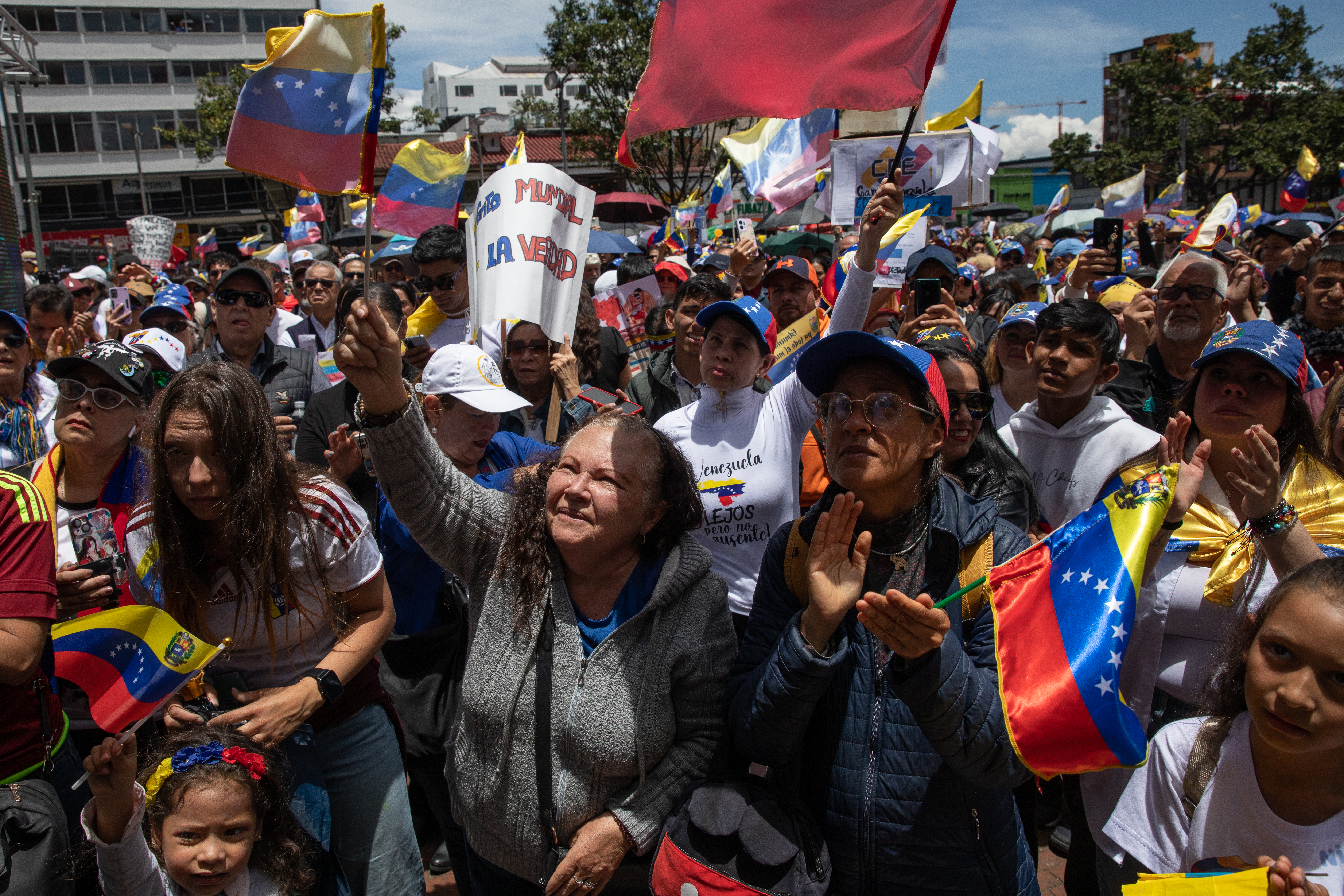 Protesters gather in the streets of Bogota to call for transparent elections in Venezuela.
