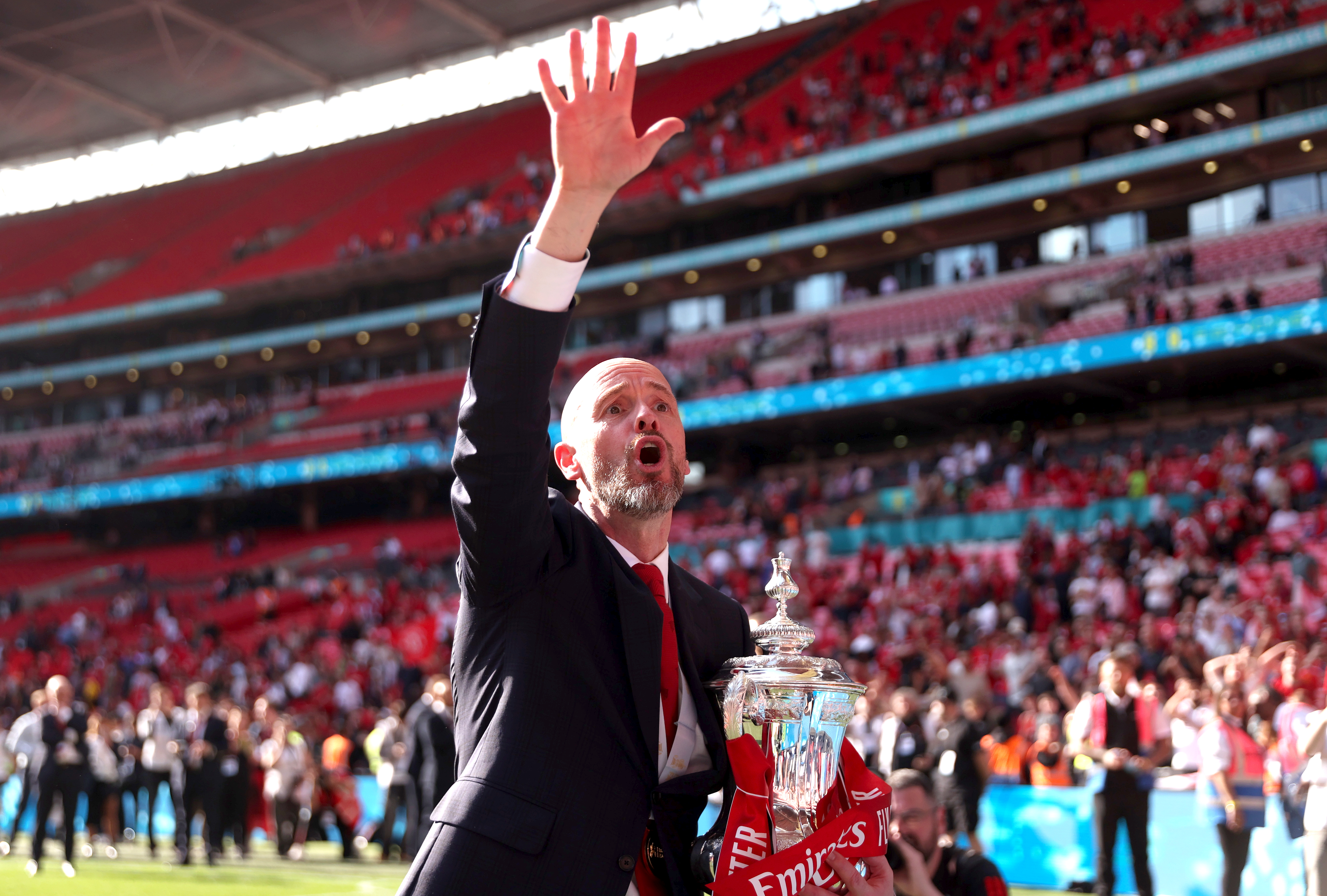 LONDON, ENGLAND - MAY 25: Erik ten Hag, Manager of Manchester United celebrates with the trophy during the Emirates FA Cup Final match between Manchester City and Manchester United at Wembley Stadium on May 25, 2024 in London, England. (Photo by Alex Pantling/Getty Images )