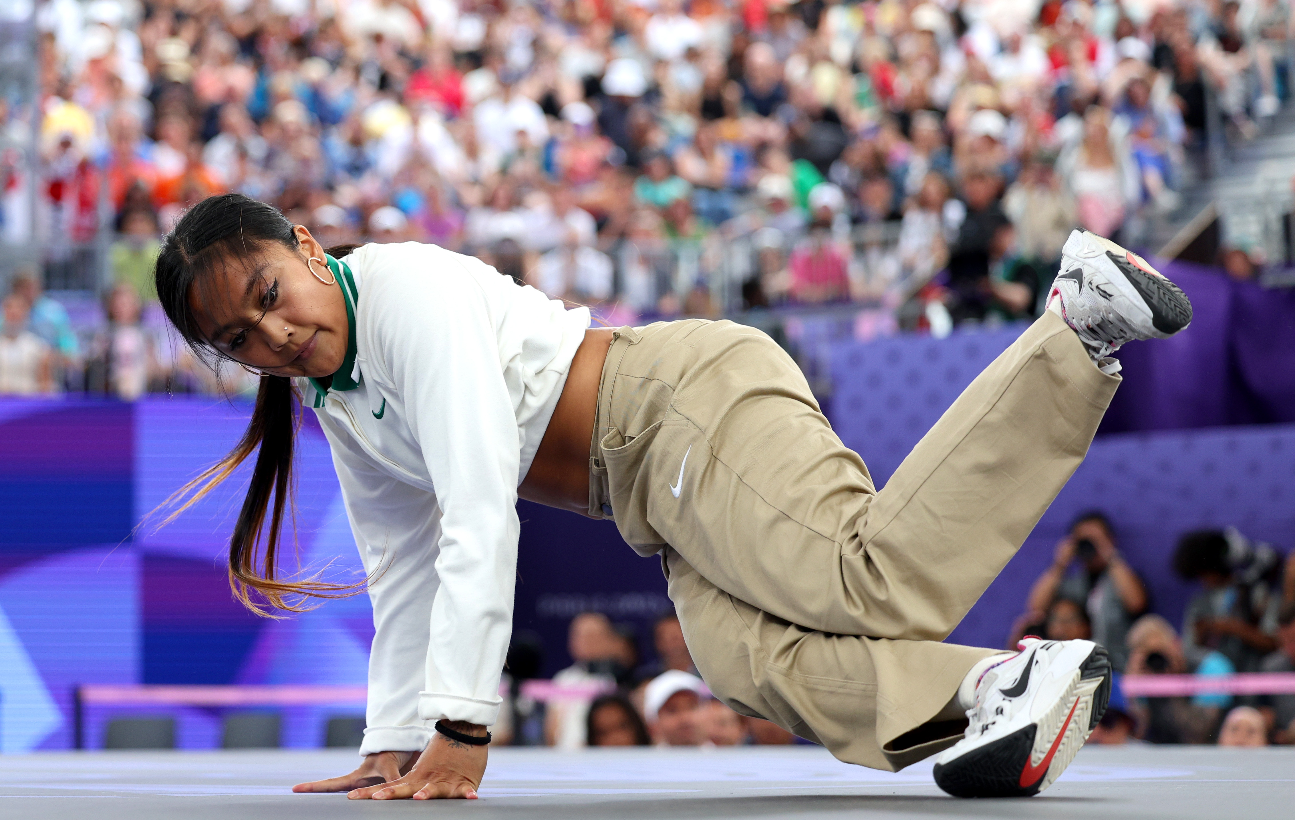 B-Girl Logistx, 21, of Team United States and who has also competed as a part of the youth hip-hop group The Lab, competes during the B-Girls Round Robin – Group B on day 14 of the Olympic Games Paris 2024