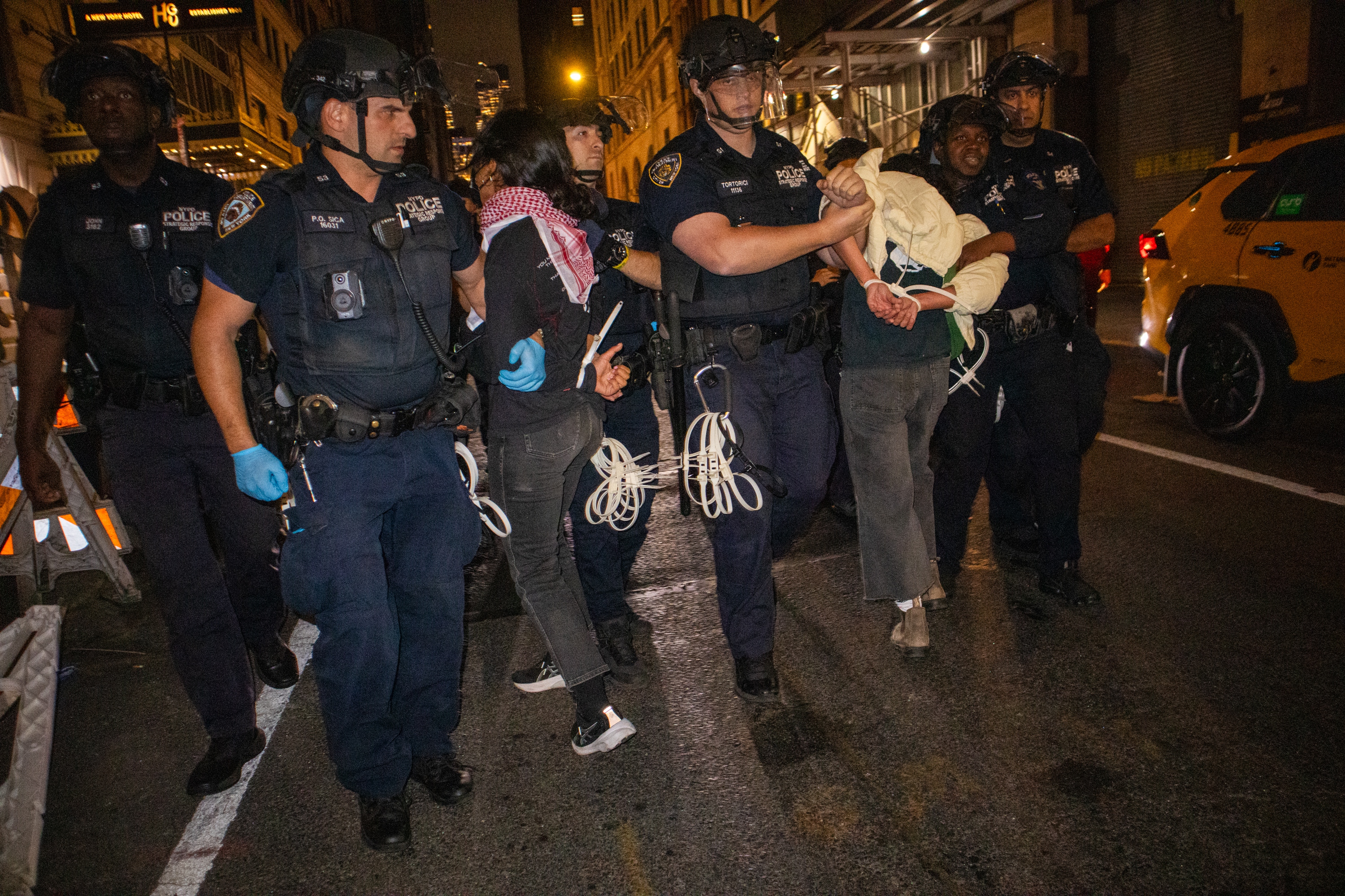People protest in solidarity with the Palestinian and Lebanese people and to condemn the Israeli airstrikes in Lebanon and Gaza, in New York