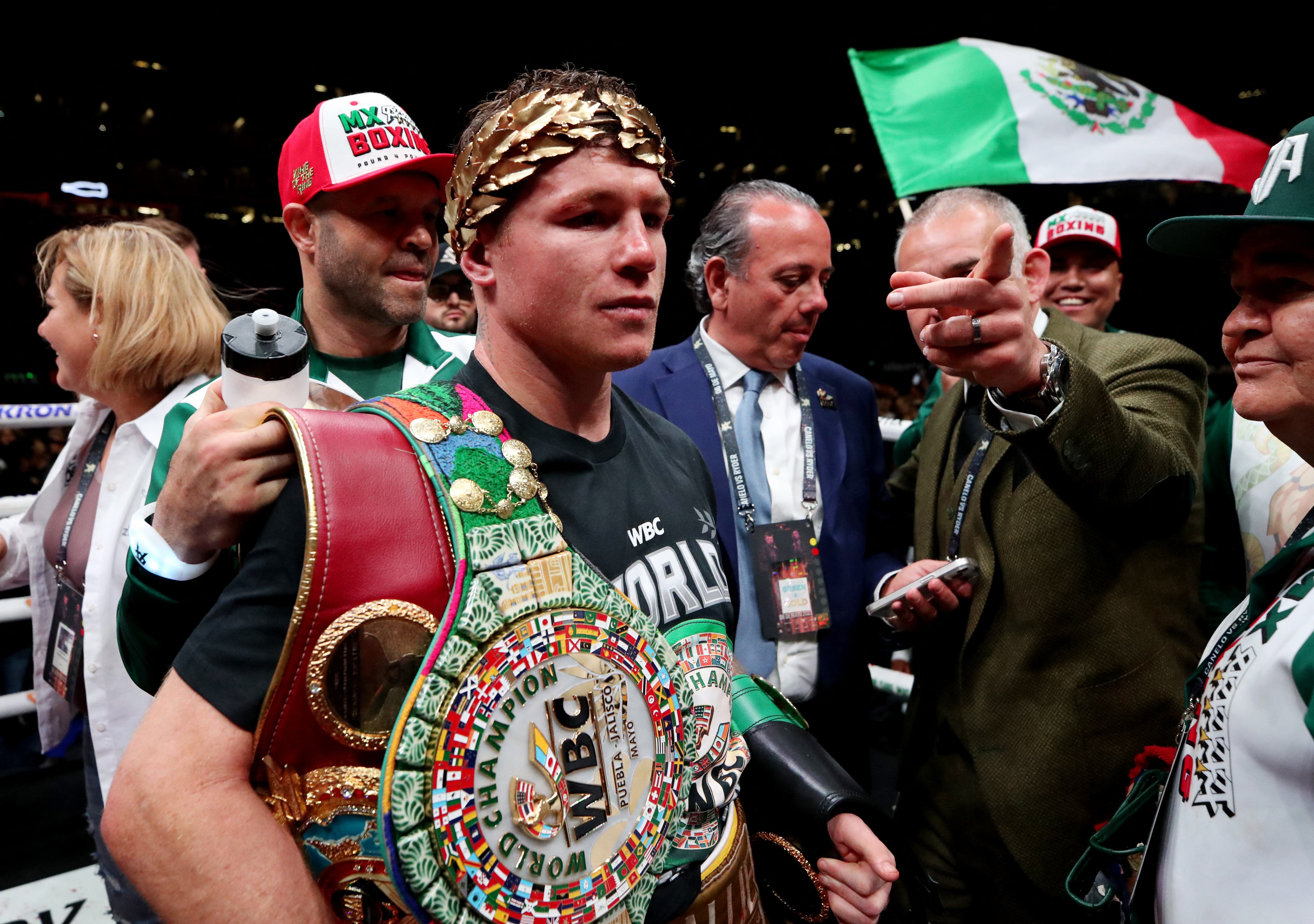 Saul 'Canelo' Alvarez celebrates after winning his super middleweight fight against John Ryder