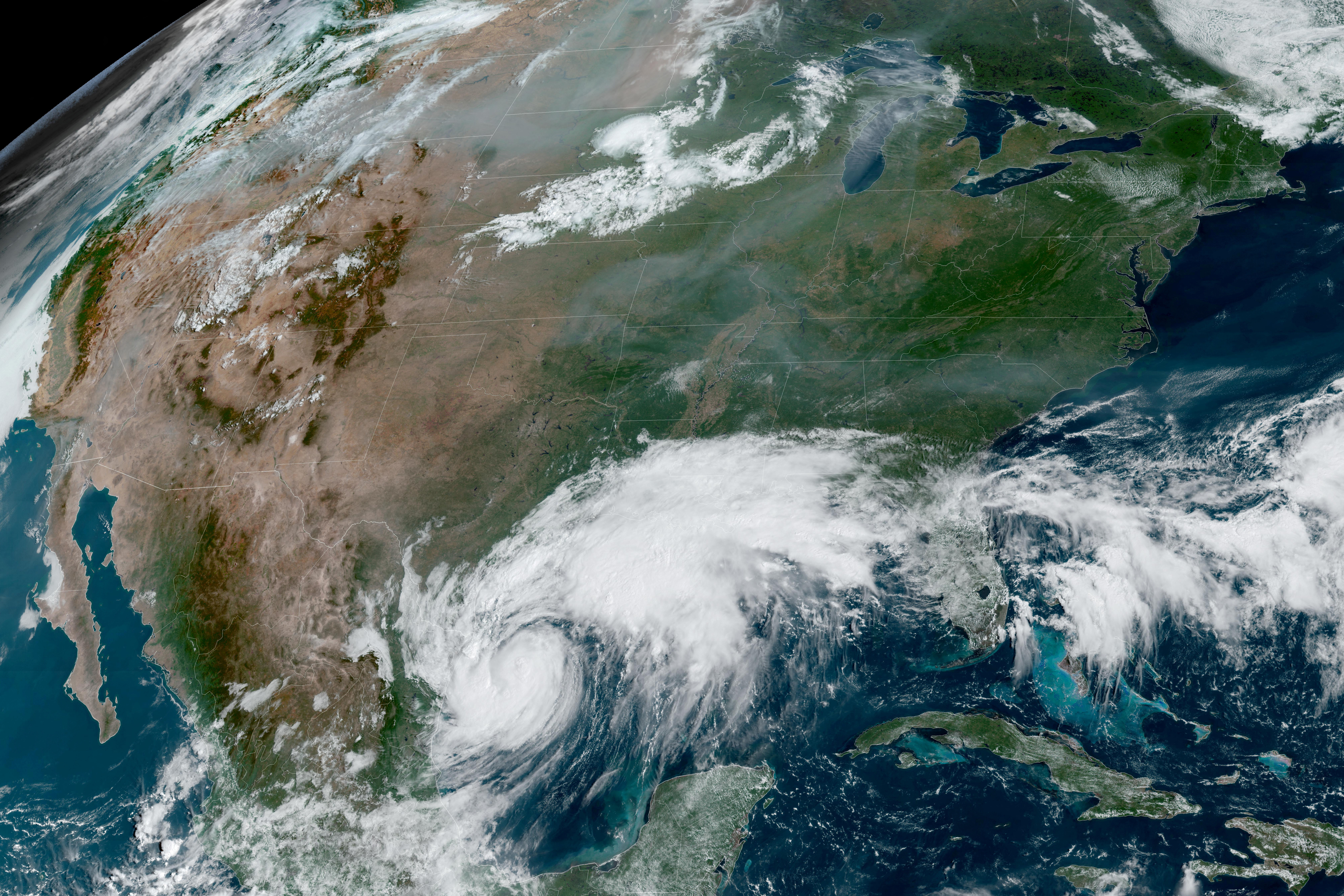 A composite satellite image shows Tropical Storm Francine intensifying
