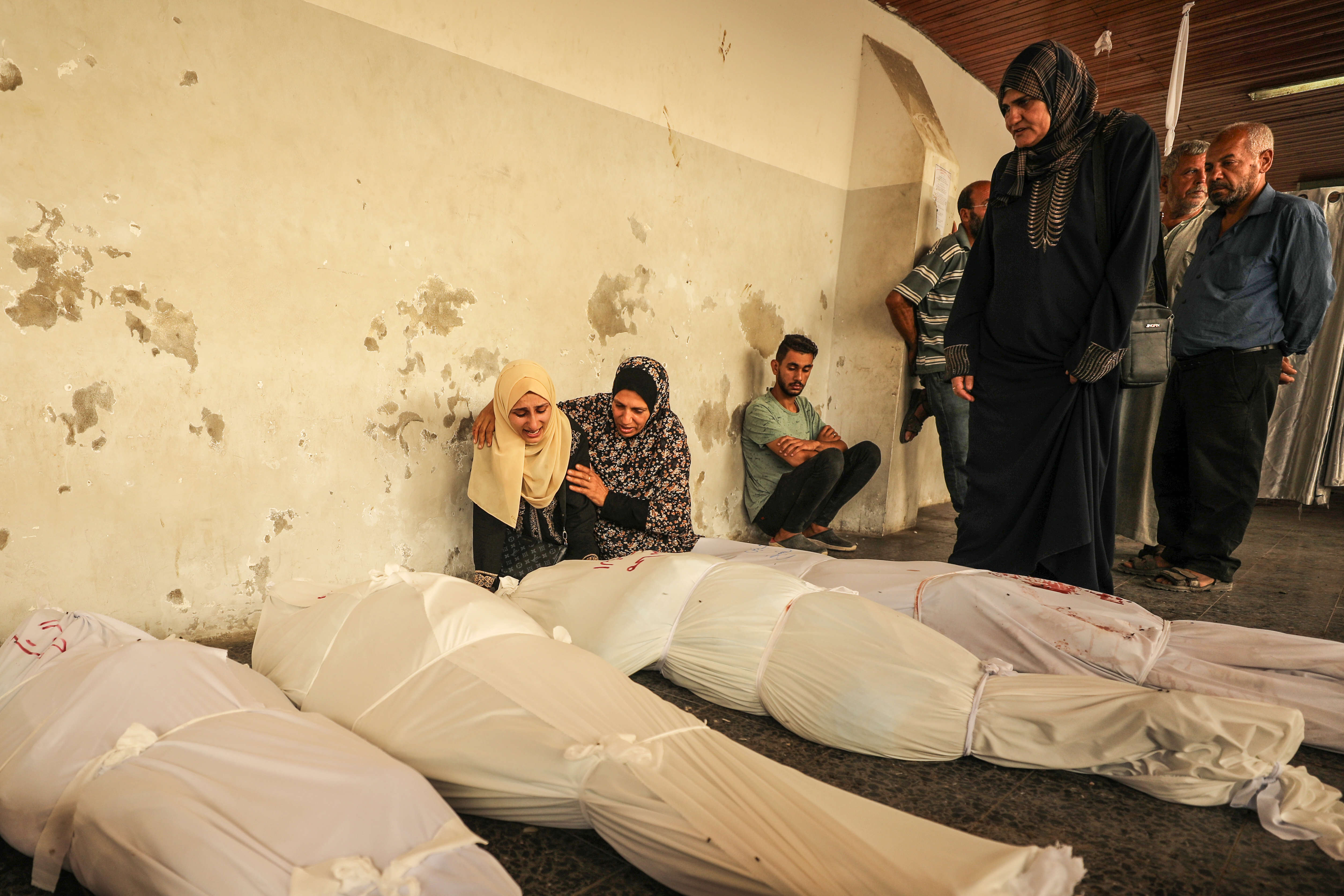 Bodies of Palestinians, who lost their lives in Israeli attack, are brought to Al-Ahli Baptist hospital