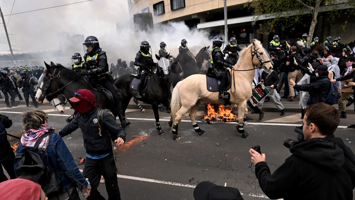 Anti-war protesters clash with police at Melbourne weapons expo