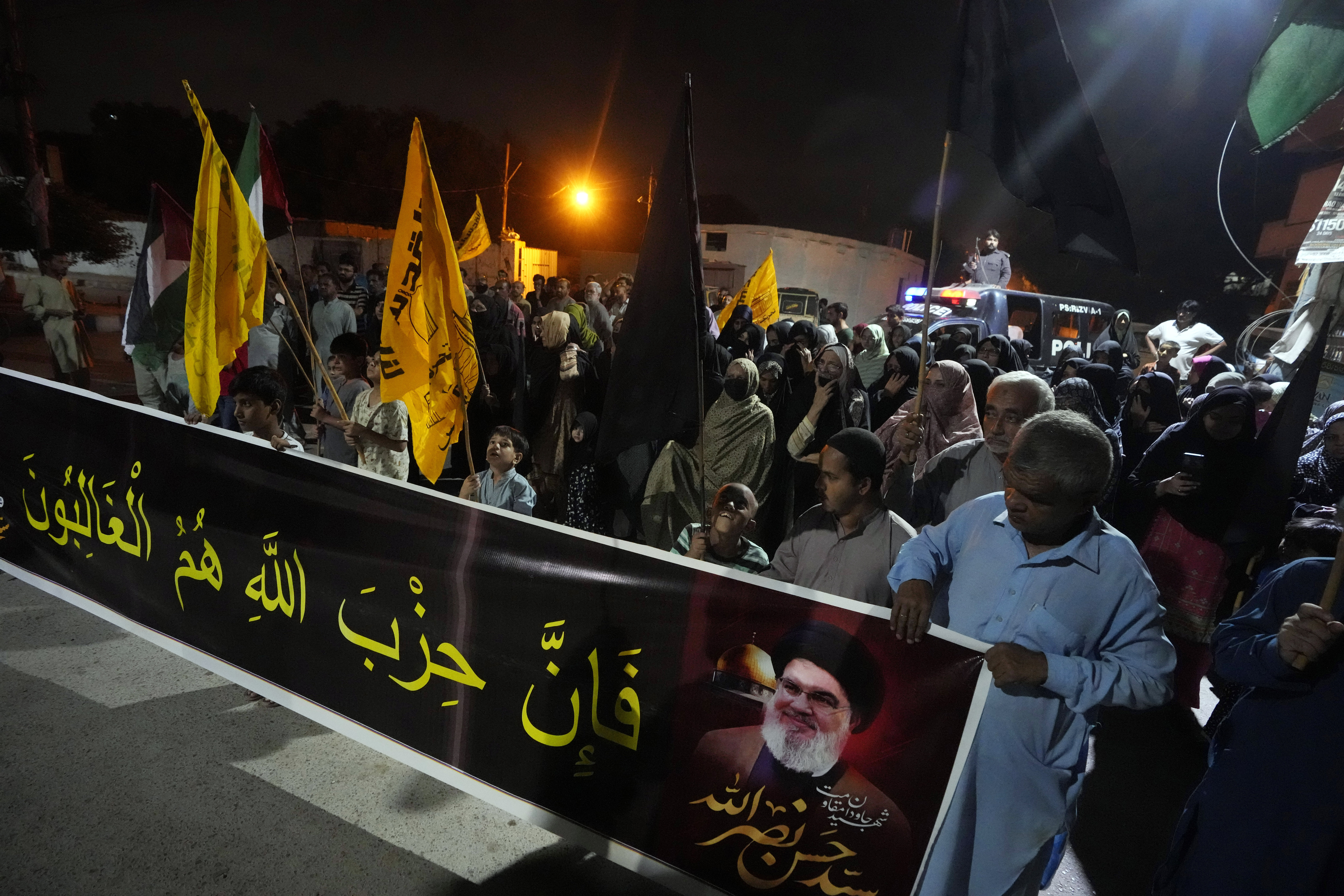 Shiite Muslims protest against the killing of Hezbollah leader Hassan Nasrallah, in Karachi,
