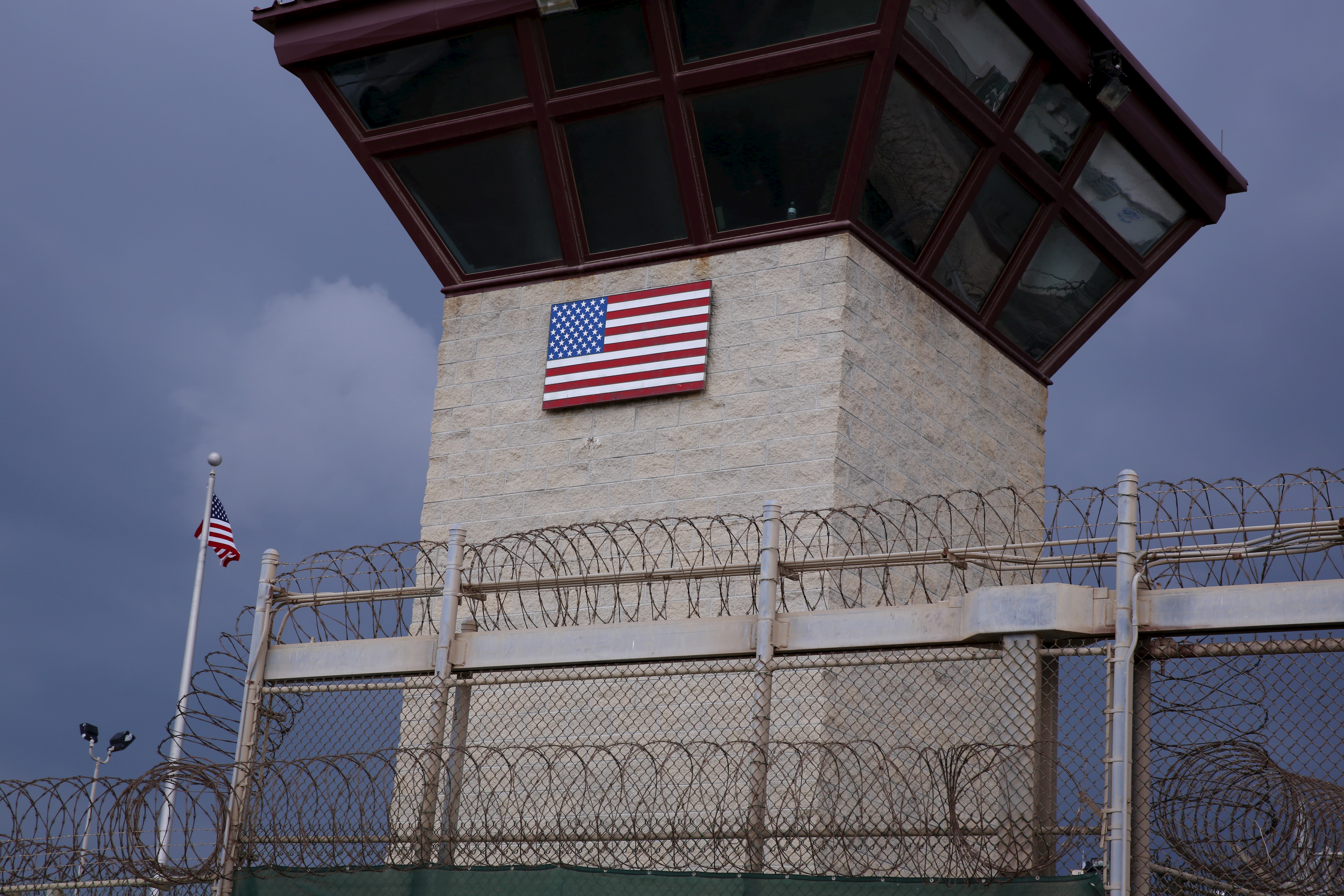 A US flag on the side of a guard tower inside Joint Task Force Guantanamo Camp VI at the US Naval Base in Guantanamo Bay, Cuba