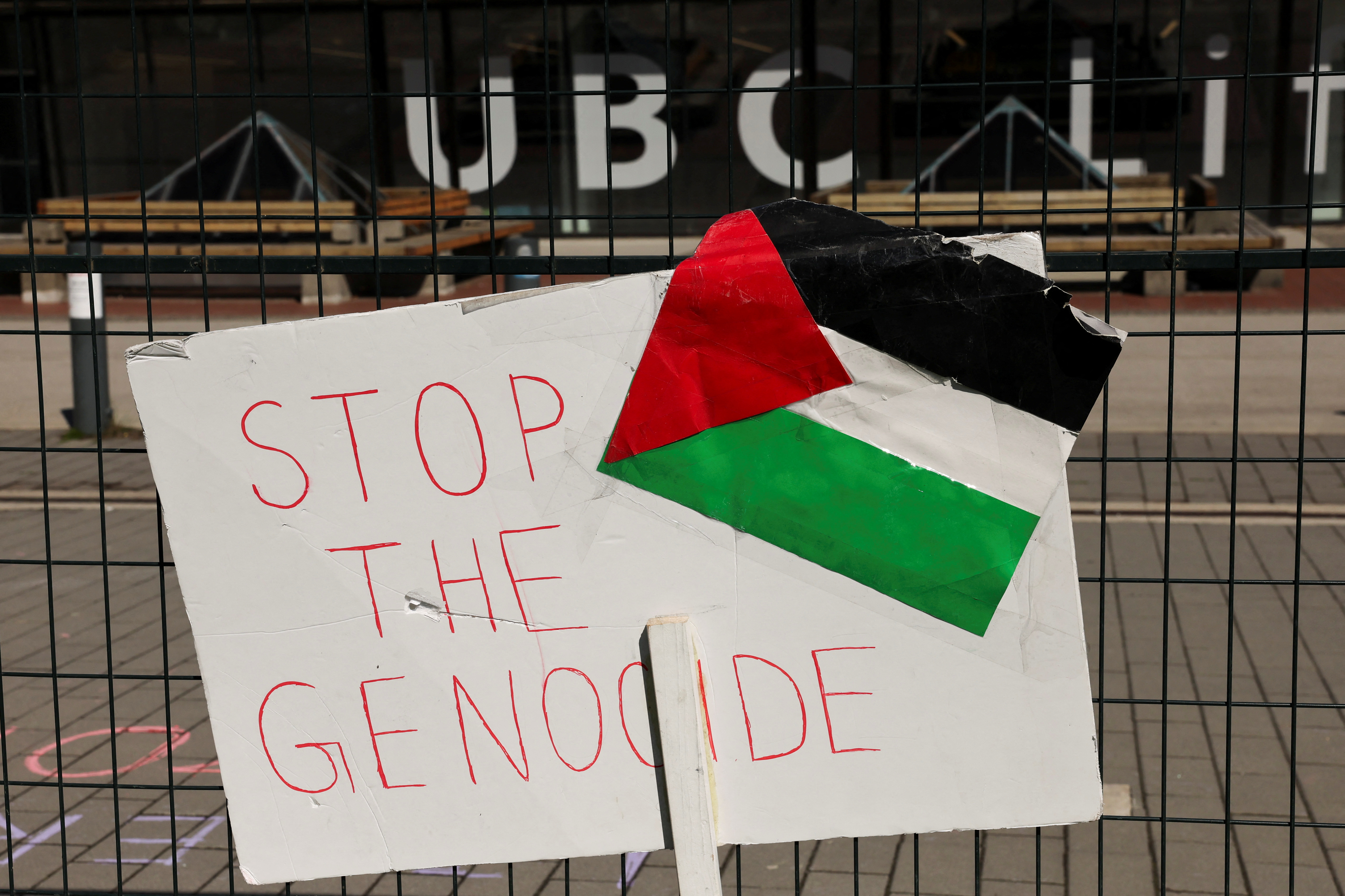 A sign and Palestinian flag seen at a protest encampment in British Columbia, Canada