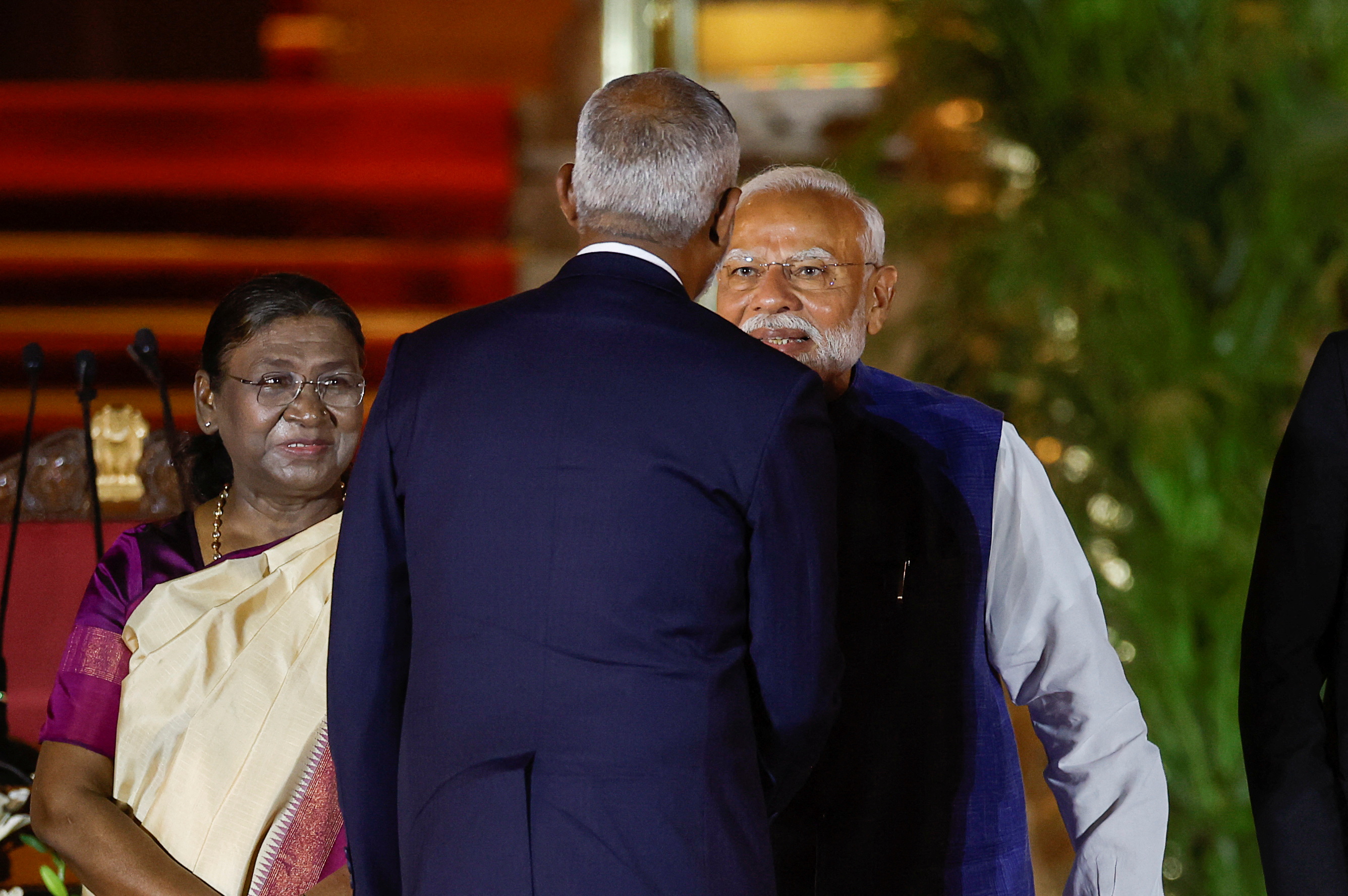India's President Droupadi Murmu and Prime Minister Narendra Modi stand with Maldives' President Mohamed Muizzu