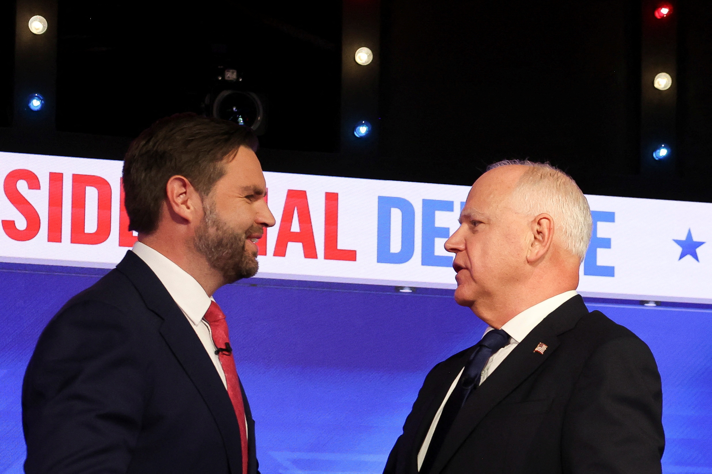 JD Vance and Tim Walz on the debate stage in New York