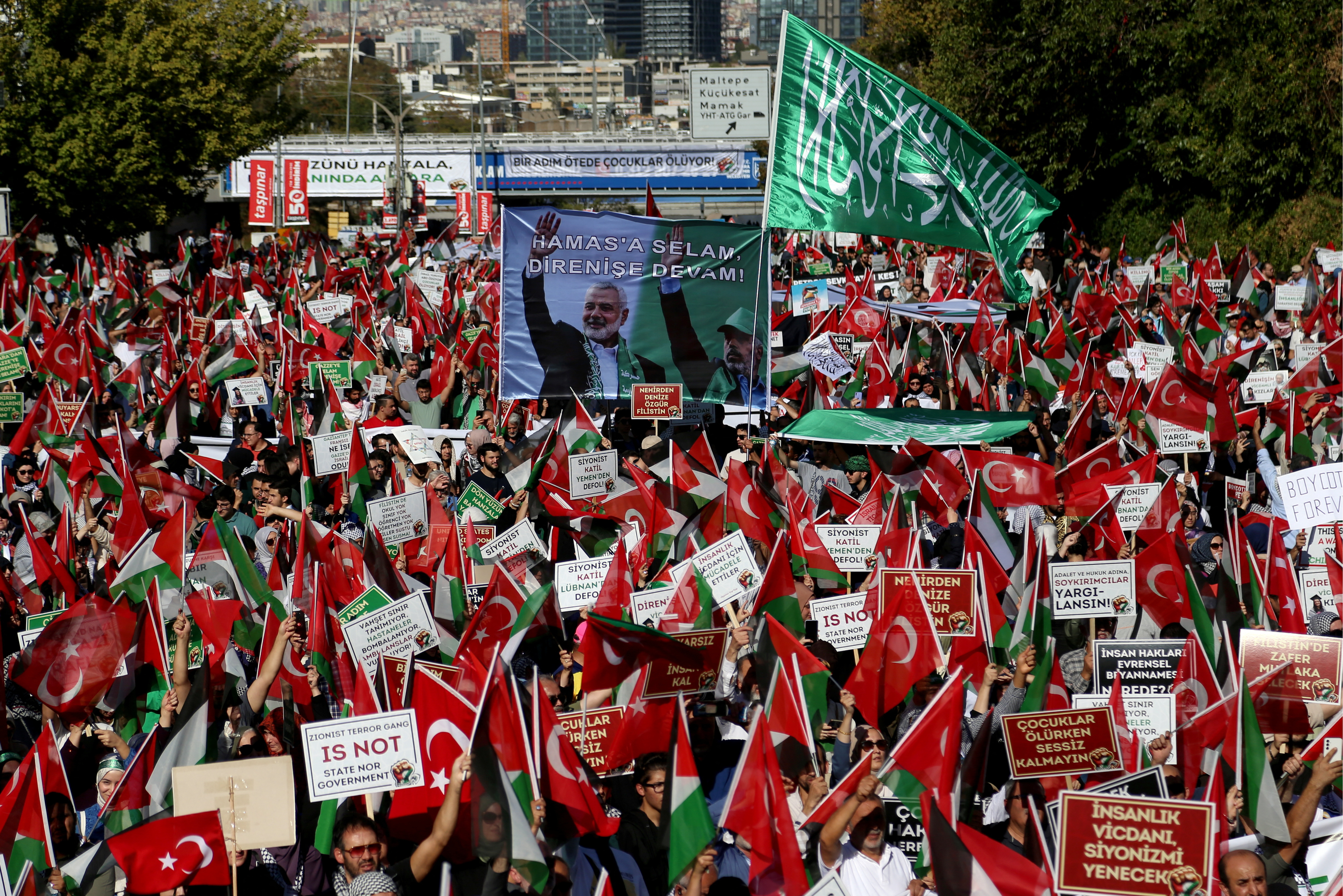 Demonstrators wave Turkish and Palestinian flags during a protest to express support for Palestinians in Gaza, a day ahead of the anniversary of the October 7th attack, amid the Israel-Hamas conflict, in Ankara, Turkey, October 6