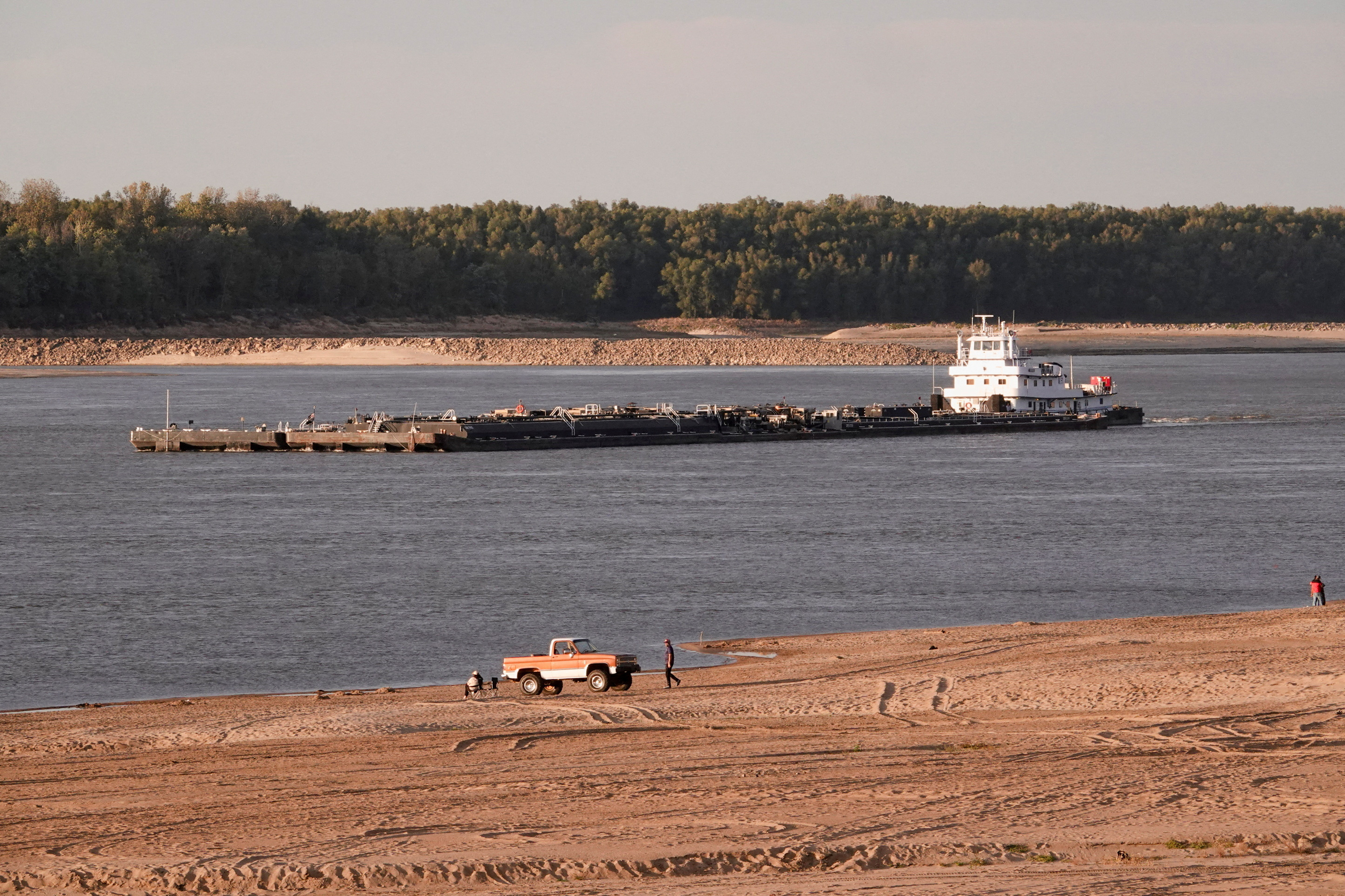 Barges make their way down the Mississippi River, where the water levels have reached historically record lows in Memphis, Tennessee, US, October 23, 2022.