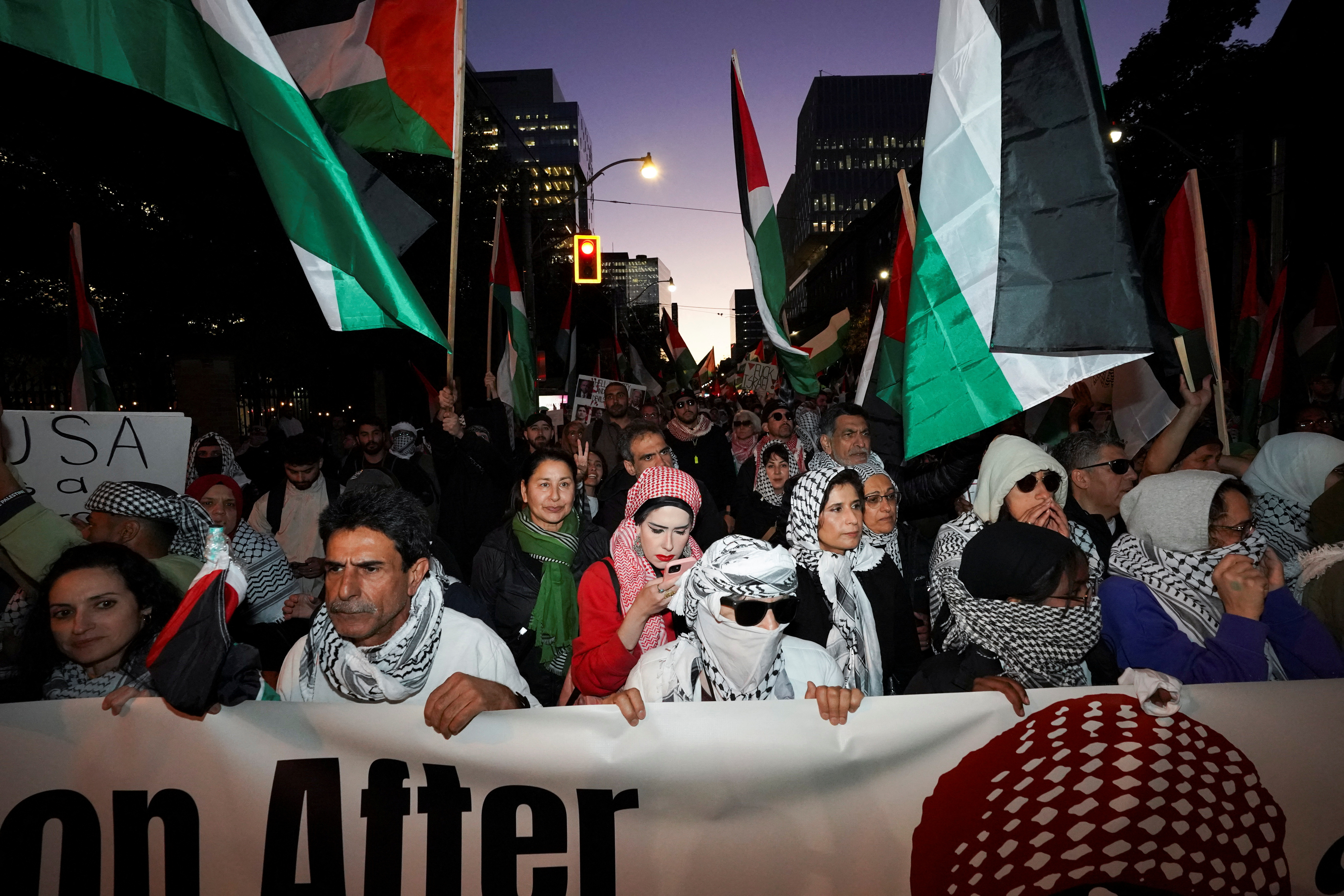 People march in support of Palestinians in Toronto, Canada