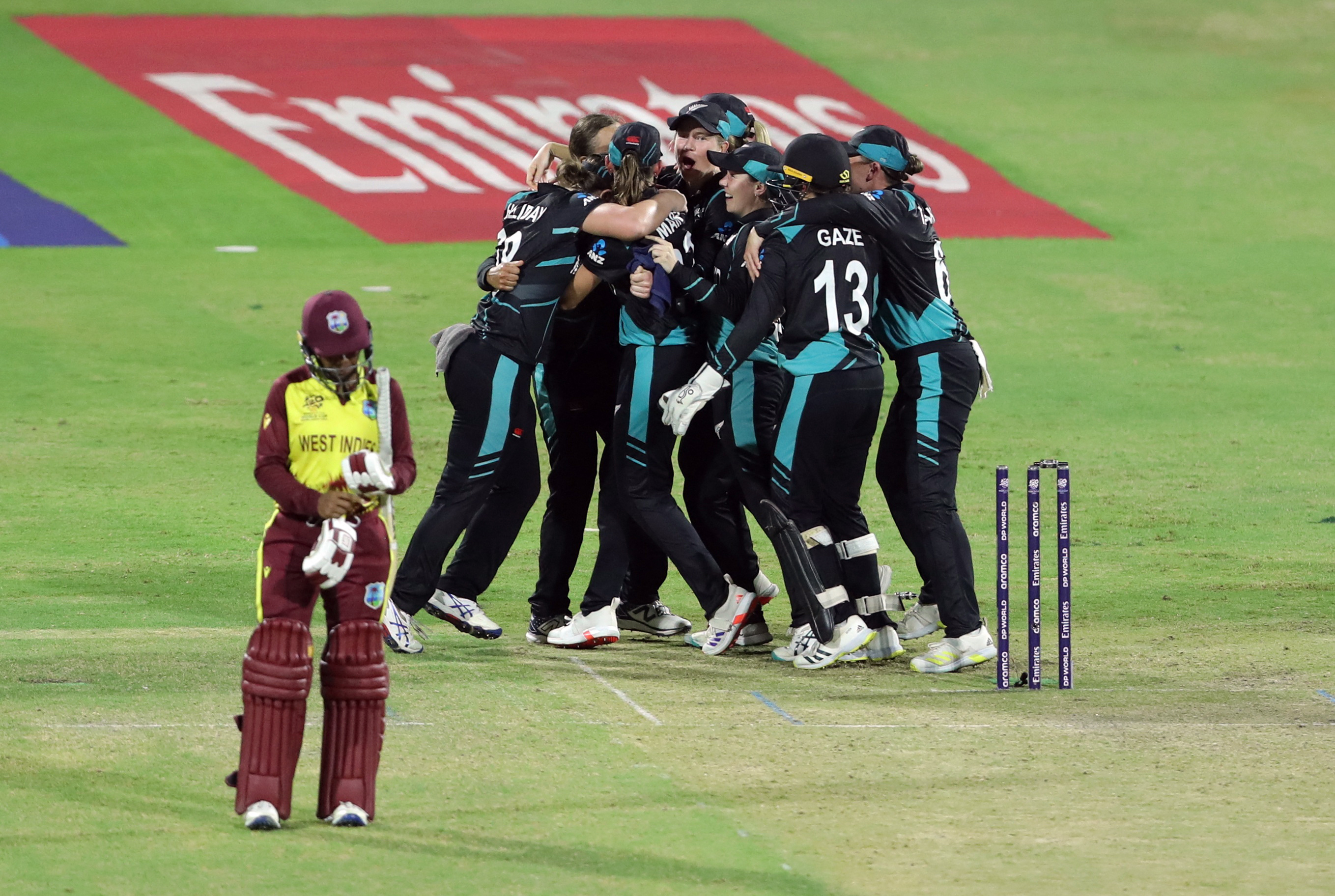 Cricket - Women's Cricket T20 World Cup - Semi Final - West Indies v New Zealand - Sharjah Cricket Stadium, Sharjah, United Arab Emirates - October 18, 2024 New Zealand players celebrate after winning the match REUTERS/Satish Kumar