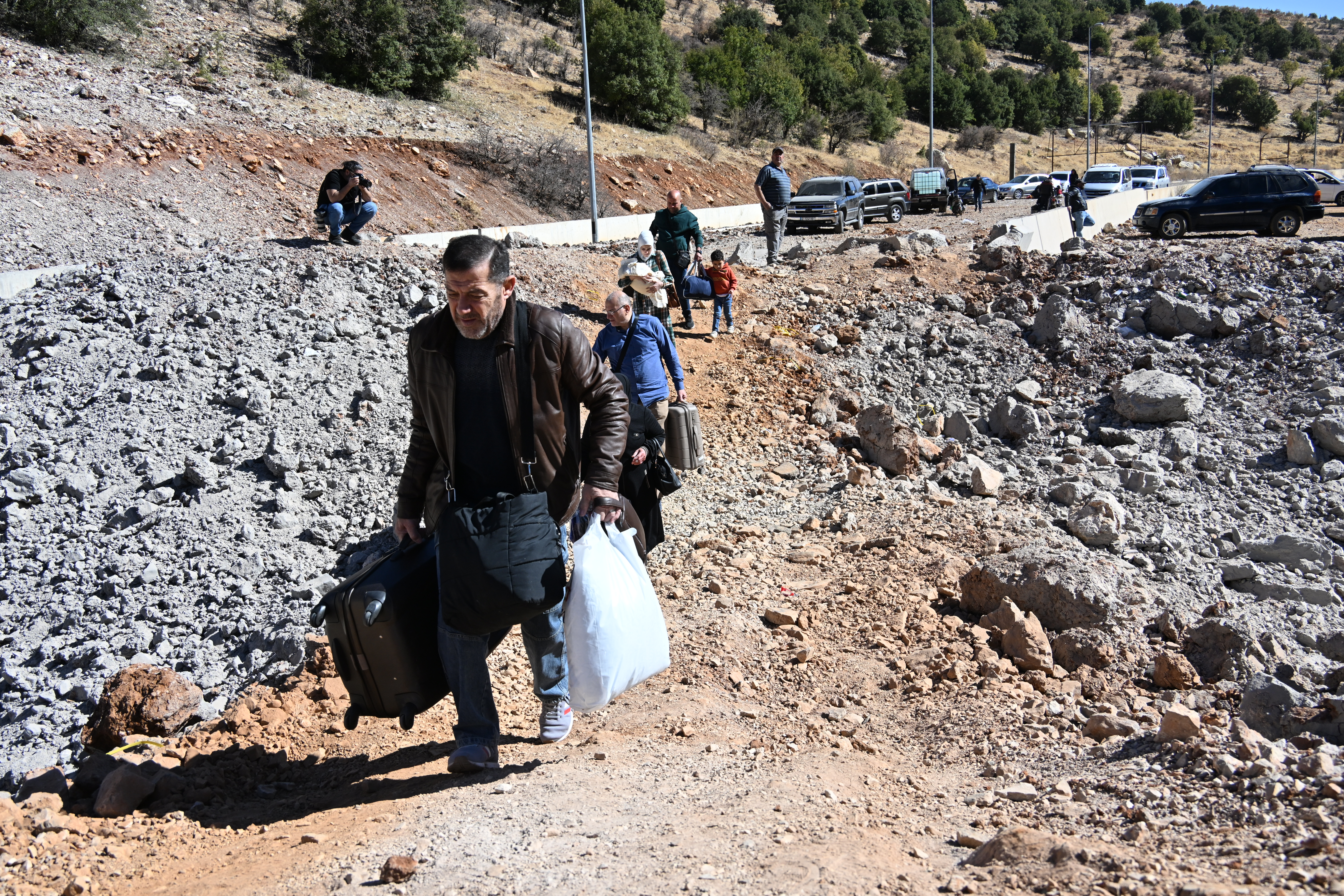 Lebanese living in Lebanon cross to Syria side with their belongings they could take with them at Masnaa Border Crossing after the Israeli attack launched airstrikes for the third time in Massna, Lebanon on October 27, 2024.