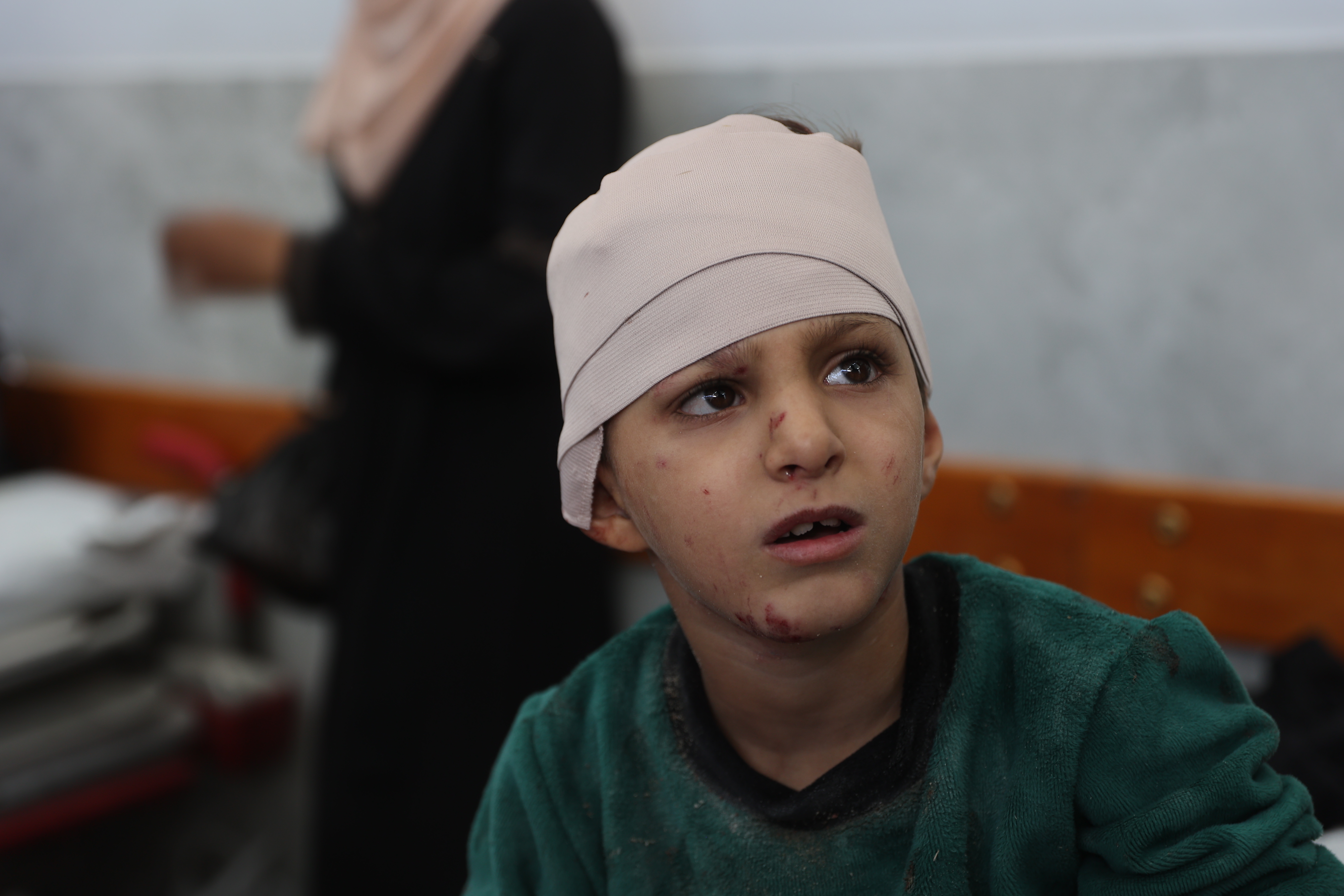 Boy with bandaged head