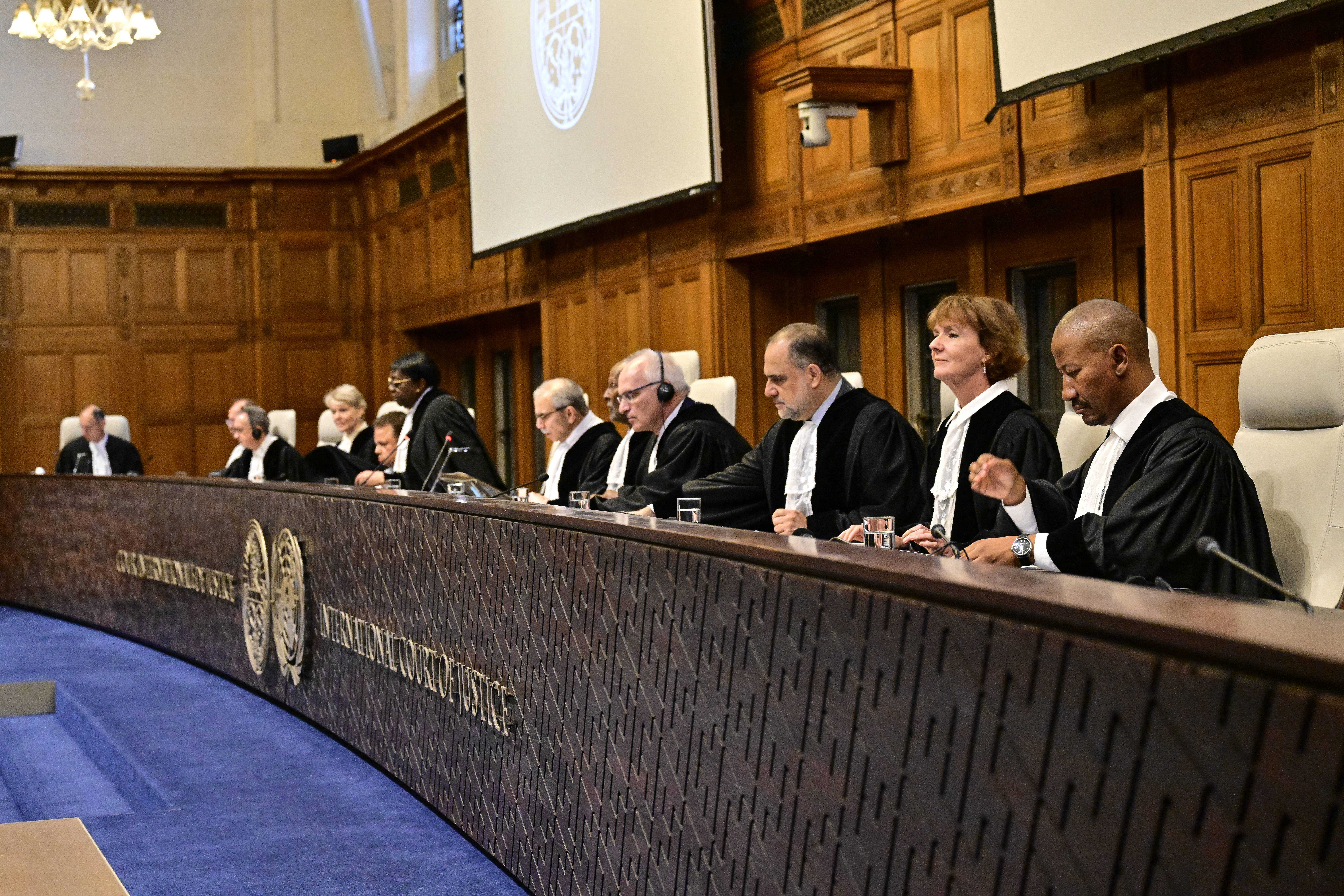 Magistrates are seen at the International Court of Justice (ICJ) as part of South Africa's request on a Gaza ceasefire in The Hague, on May 24, 2024, amid the ongoing conflict between Israel and the Hamas movement. - Pretoria has urged the International Court of Justice to order an "immediate" stop to Israel's campaign, including in the southern area of Rafah, and facilitate access of humanitarian aid. (Photo by Nick Gammon / AFP)