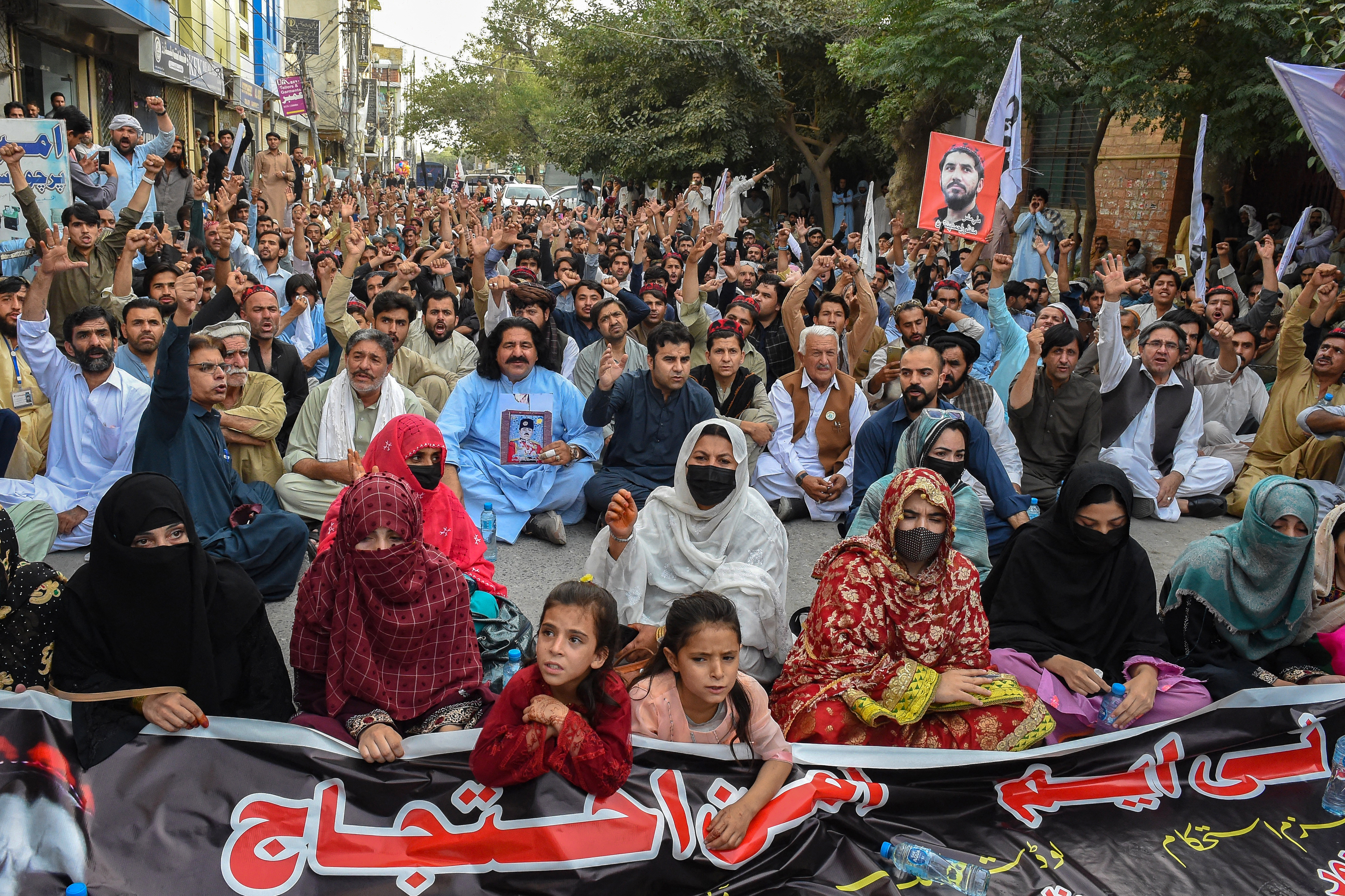 Supporters and activists of Pashtun Tahaffuz Movement take part in a protest