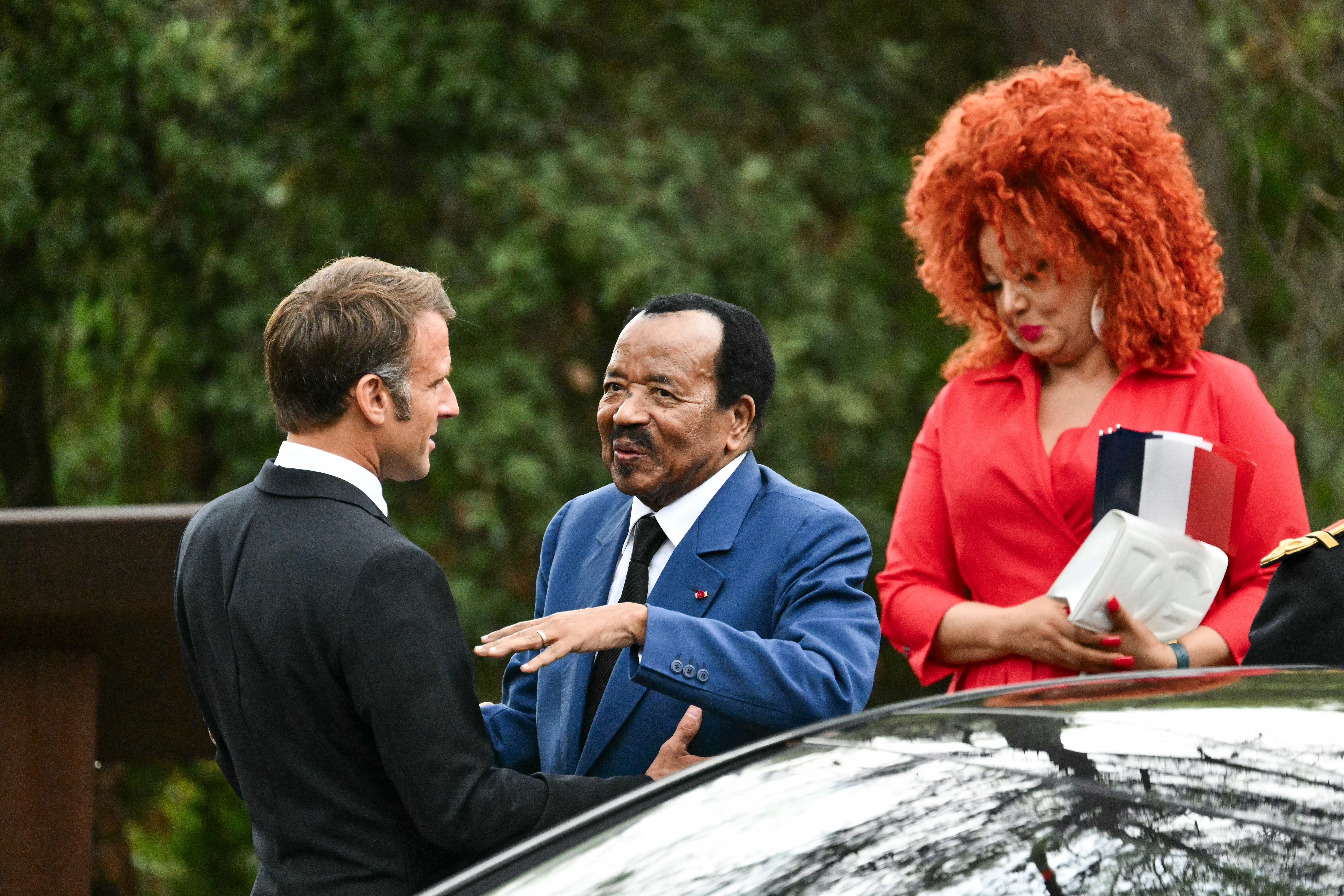 France's President Emmanuel Macron welcomes Cameroon President Paul Biya and his wife Chantal Biya