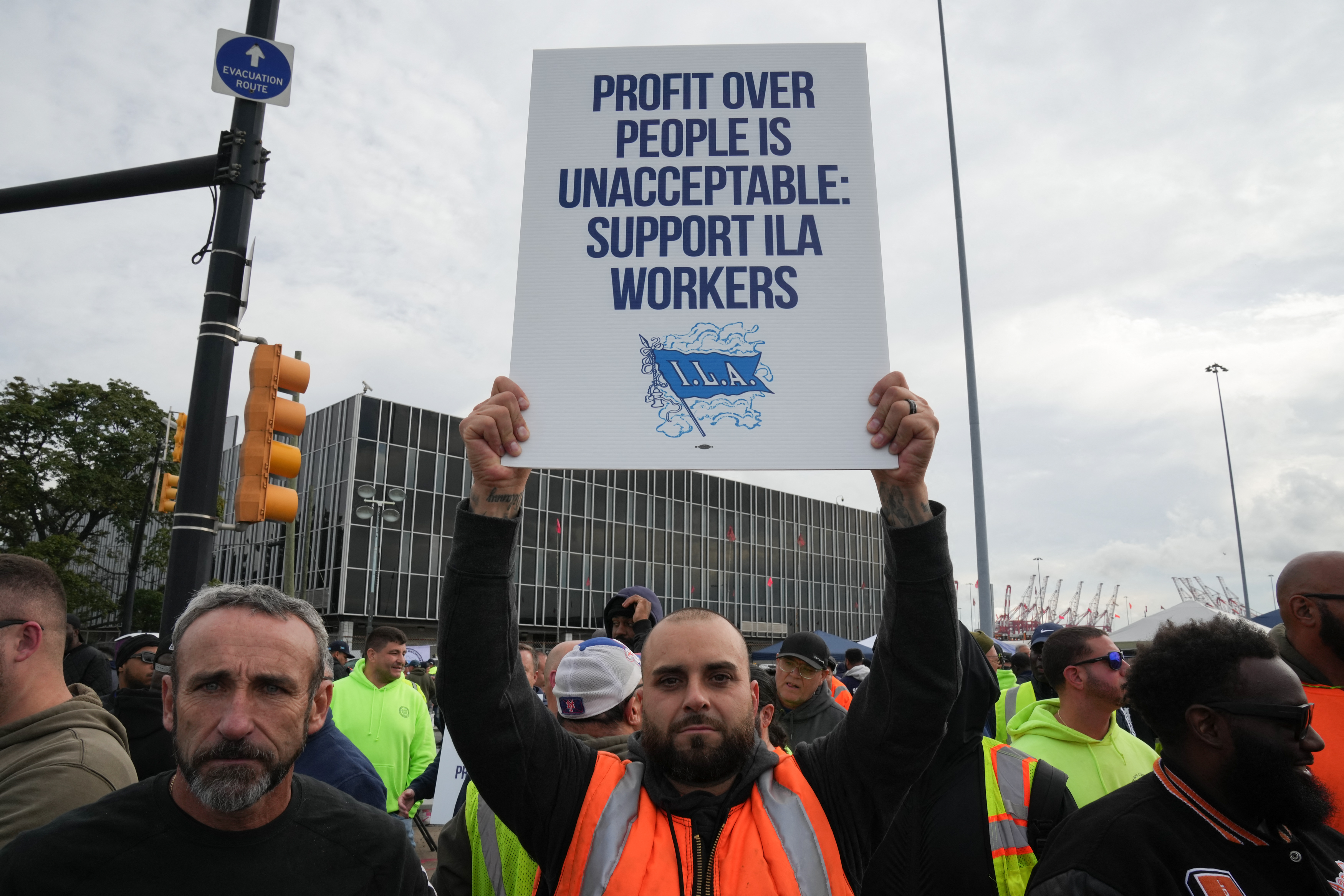 Dockworkers at the Maher Terminals in Port Newark are on strike on October 1, 2024 in New Jersey. - Officials at 14 ports along the US East and Gulf Coasts were making last-minute preparations on September 30 for a likely labor strike that could drag on the US economy just ahead of a presidential election -- despite last-minute talks. (Photo by Bryan R. SMITH / AFP)