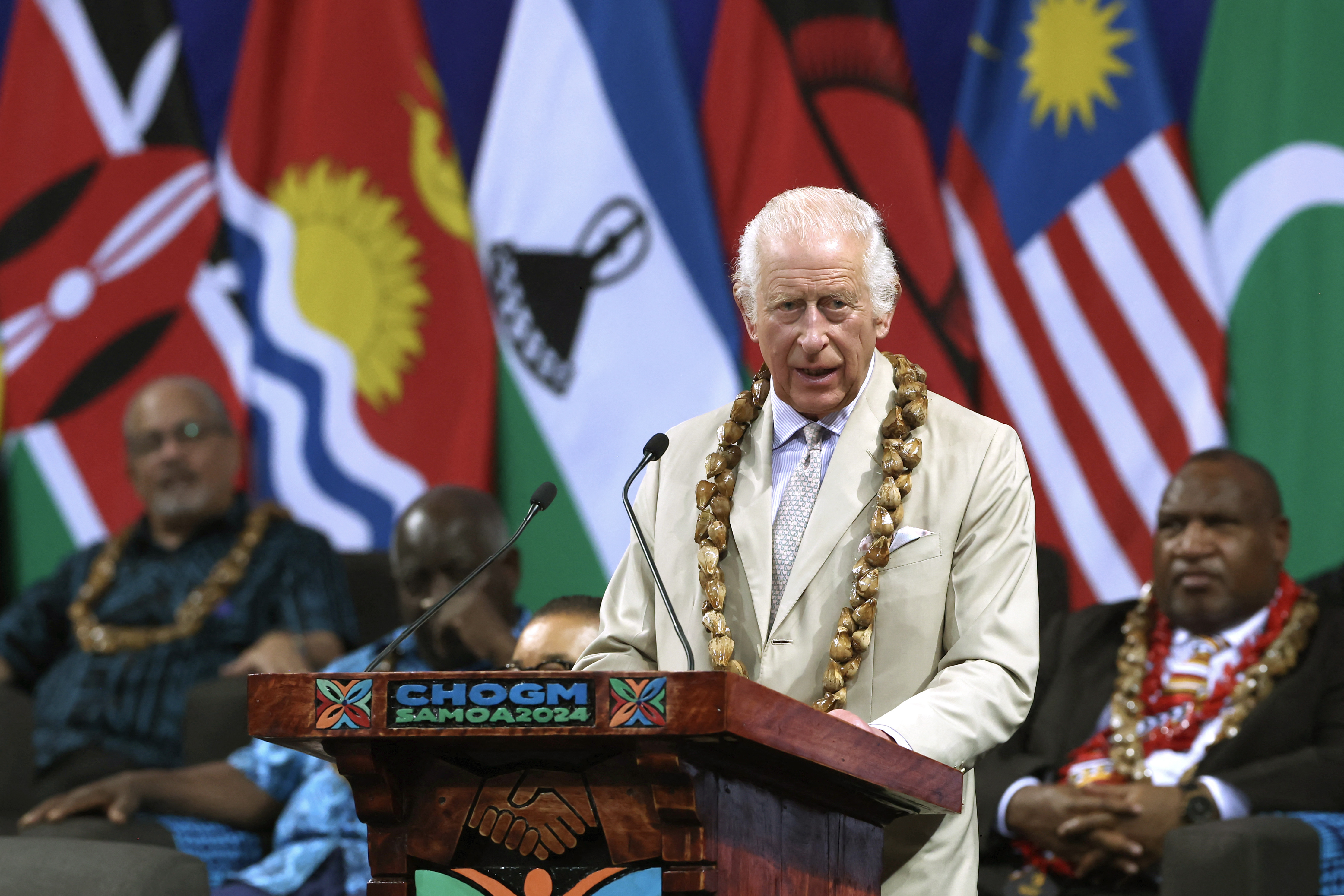 Britain's King Charles III delivers a speech during the opening ceremony for the Commonwealth Heads of Government Meeting (CHOGM) in Apia, Samoa, on October 25, 2024.