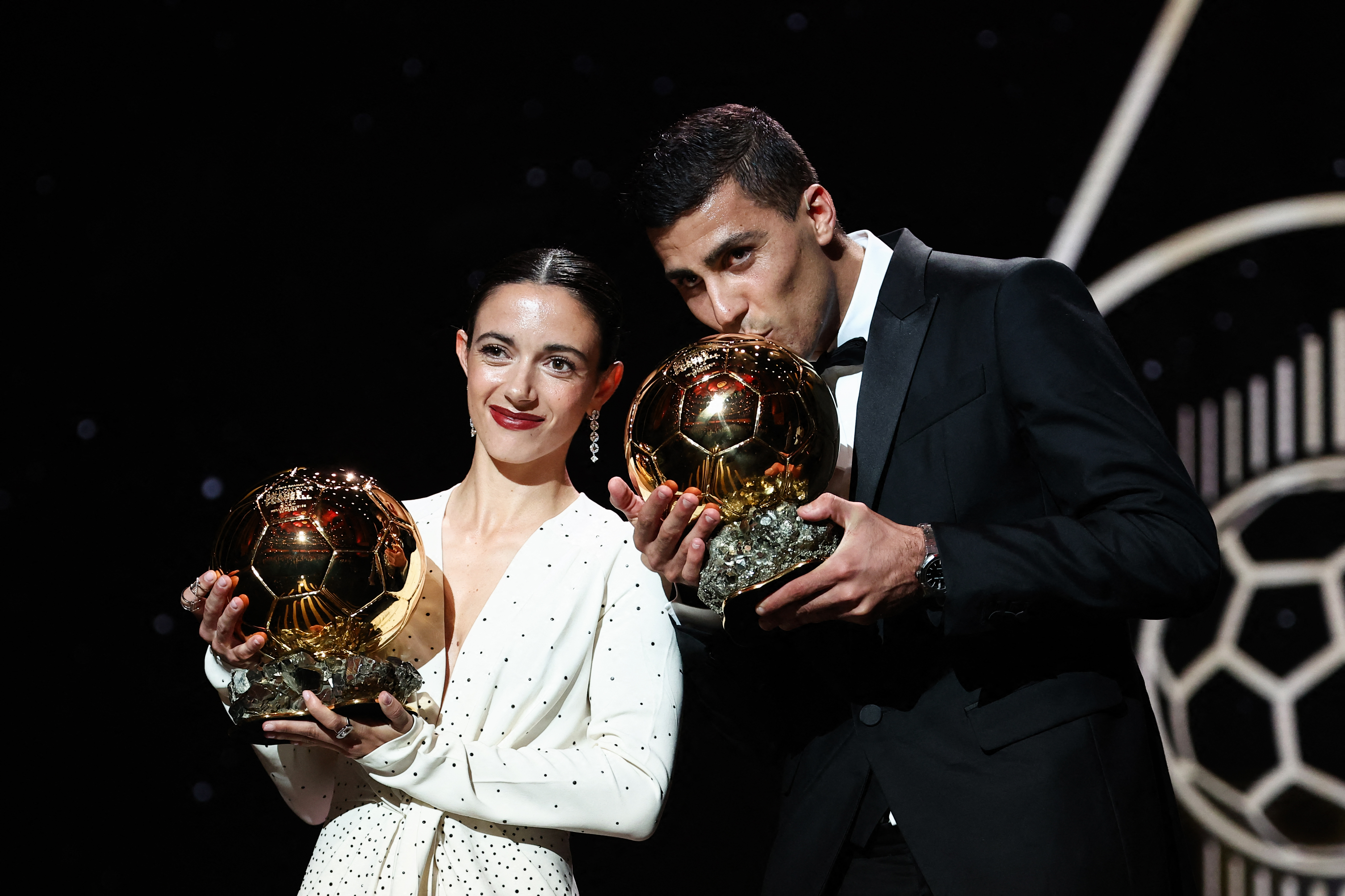 Spanish midfielder Aitana Bonmati of Barcelona retained her Ballon d'Or award, while Manchester City's Rodri won his first at the 2024 Ballon d'Or France Football award ceremony