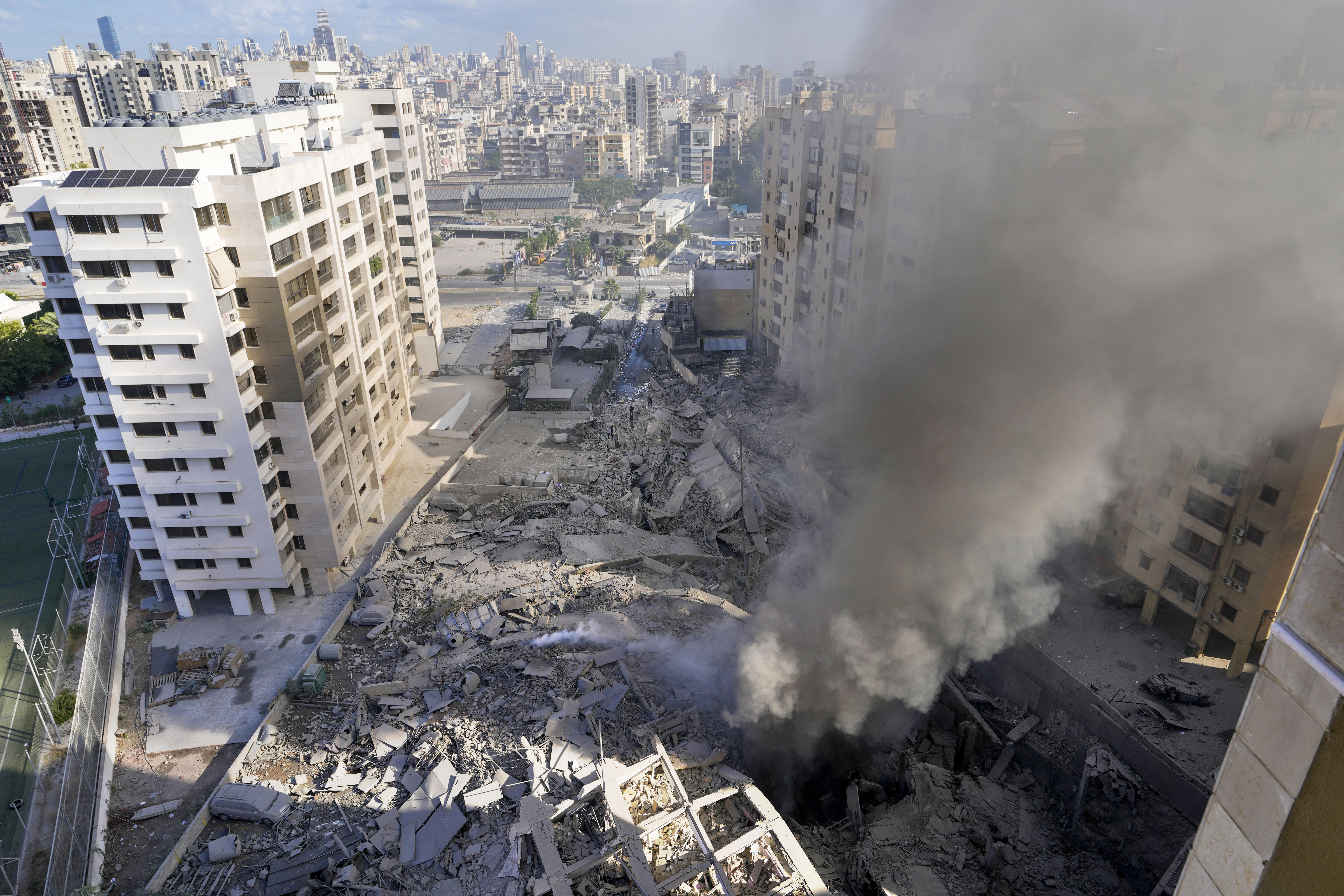 Smoke rises from the site of an Israeli airstrike in Dahiyeh, Beirut, Lebanon, Wednesday, Oct. 2
