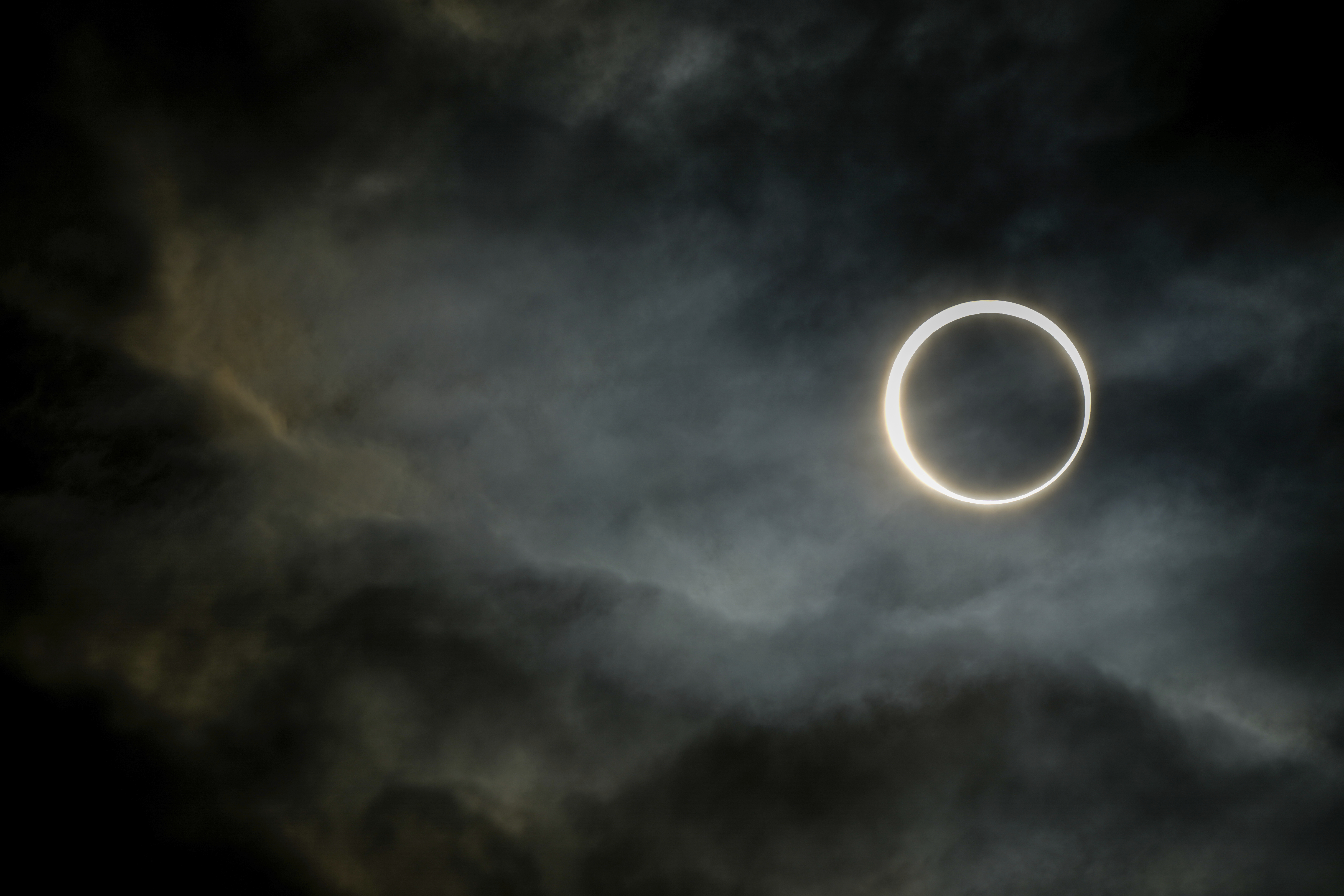 A view of the eclipse through the clouds.