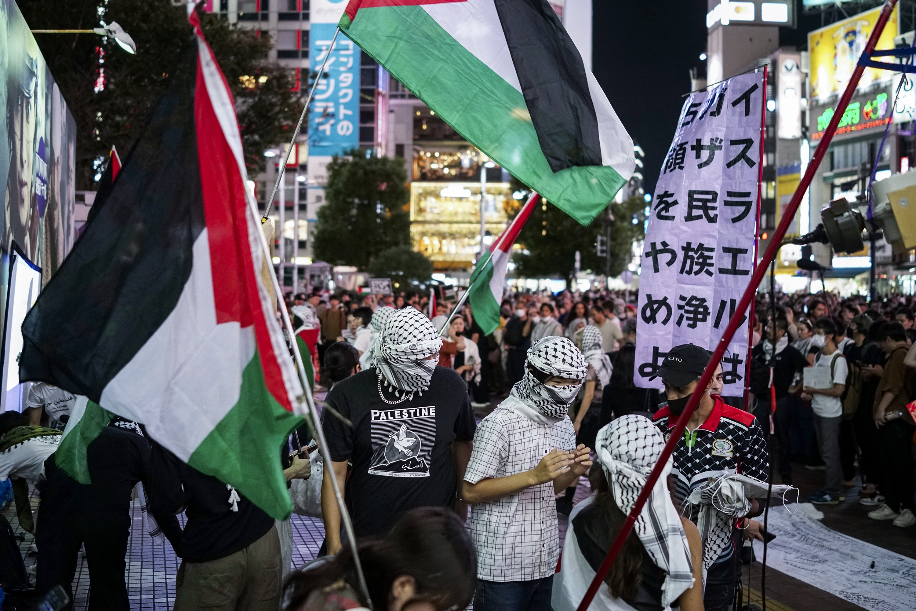 Protesters demonstrate against Israel as they appeal for immediate ceasefire in Gaza, during a rally, Monday, Oct. 7, 2024 near the Shibuya pedestrian crossing in Tokyo