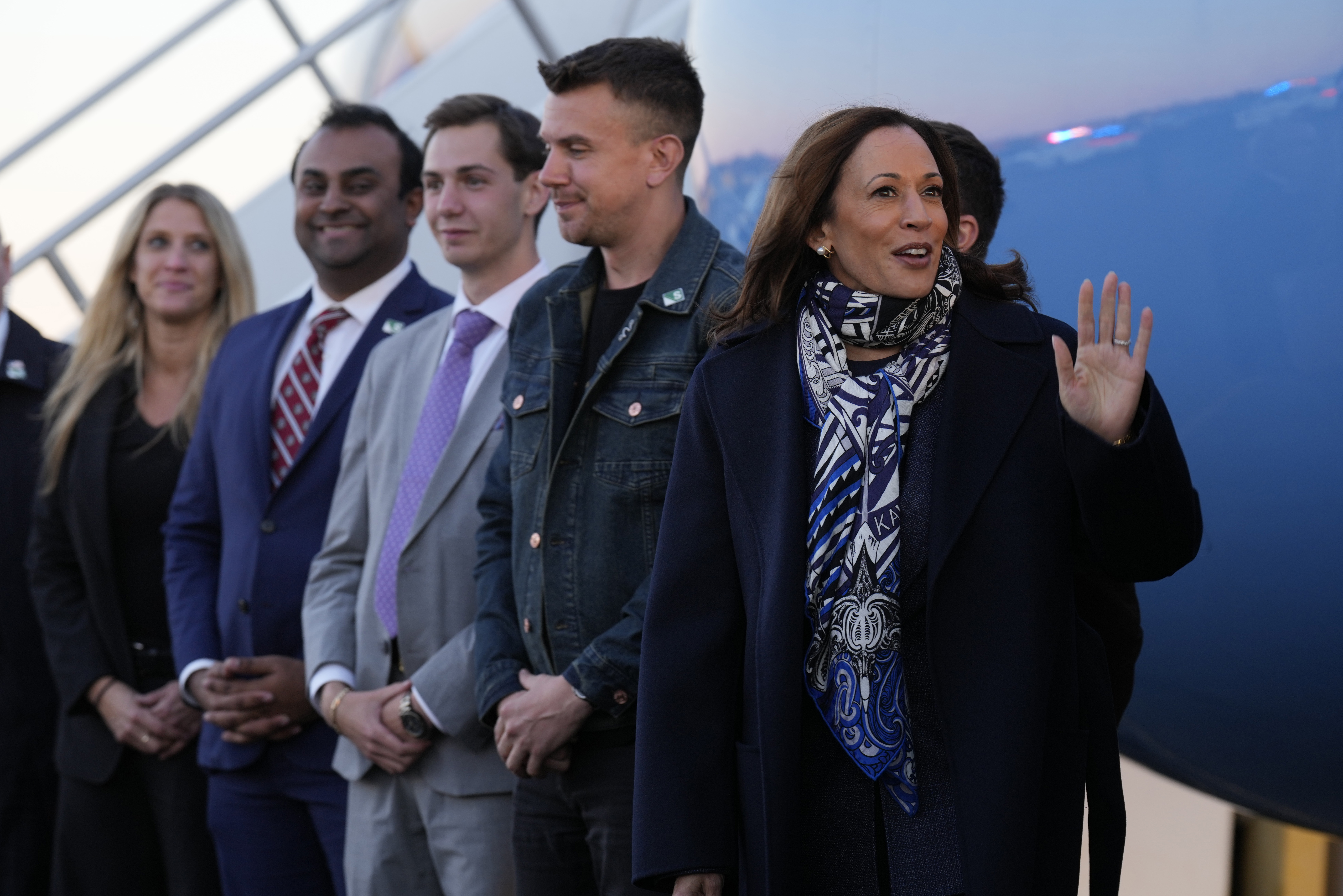 Democratic presidential nominee Vice President Kamala Harris waves at Trenton-Mercer Airport, in Mercer County, N.J., before departing en route to Milwaukee, Wednesday, Oct. 16, 2024. 
