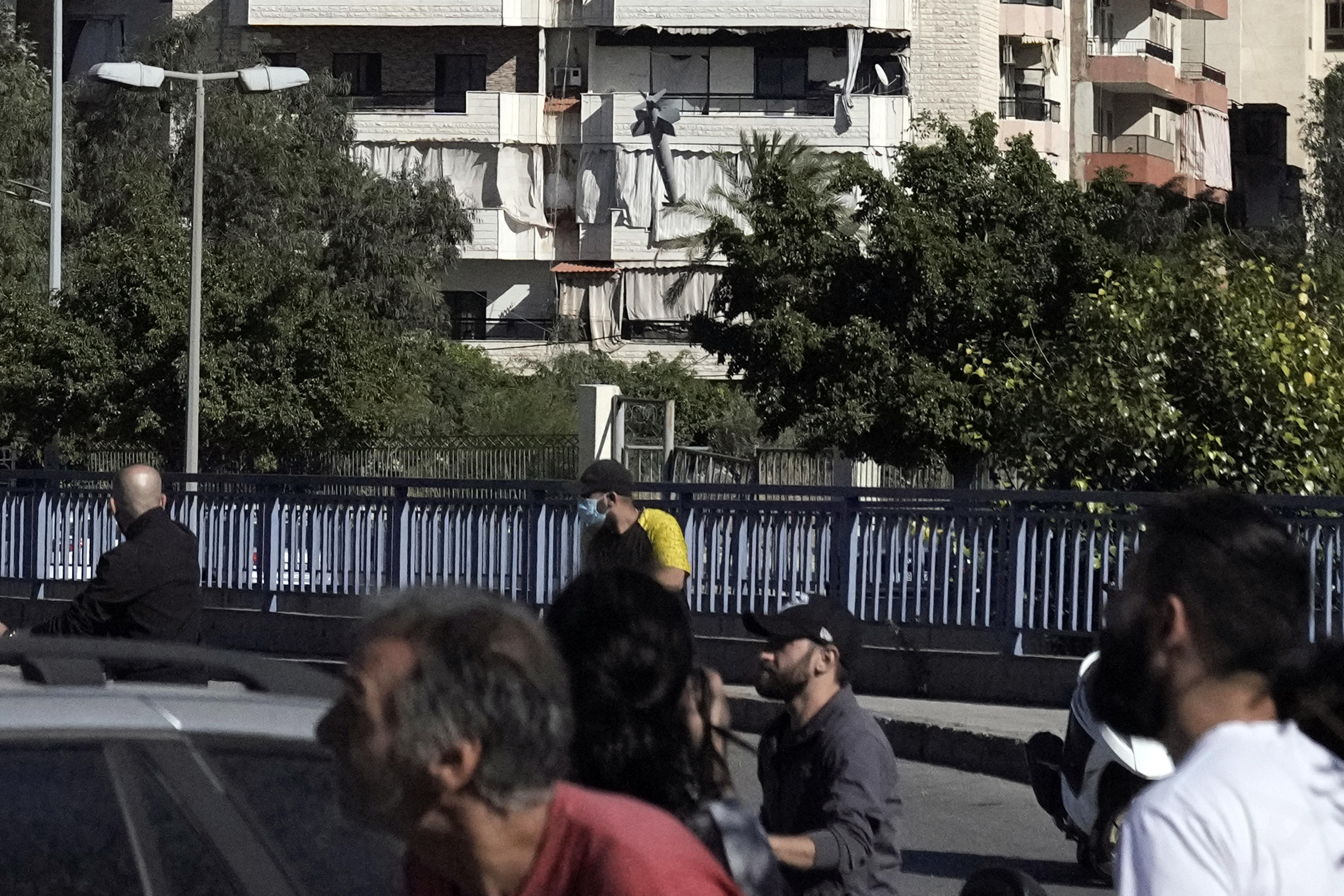 Images capture exact moments an Israeli missile strikes building in Beirut