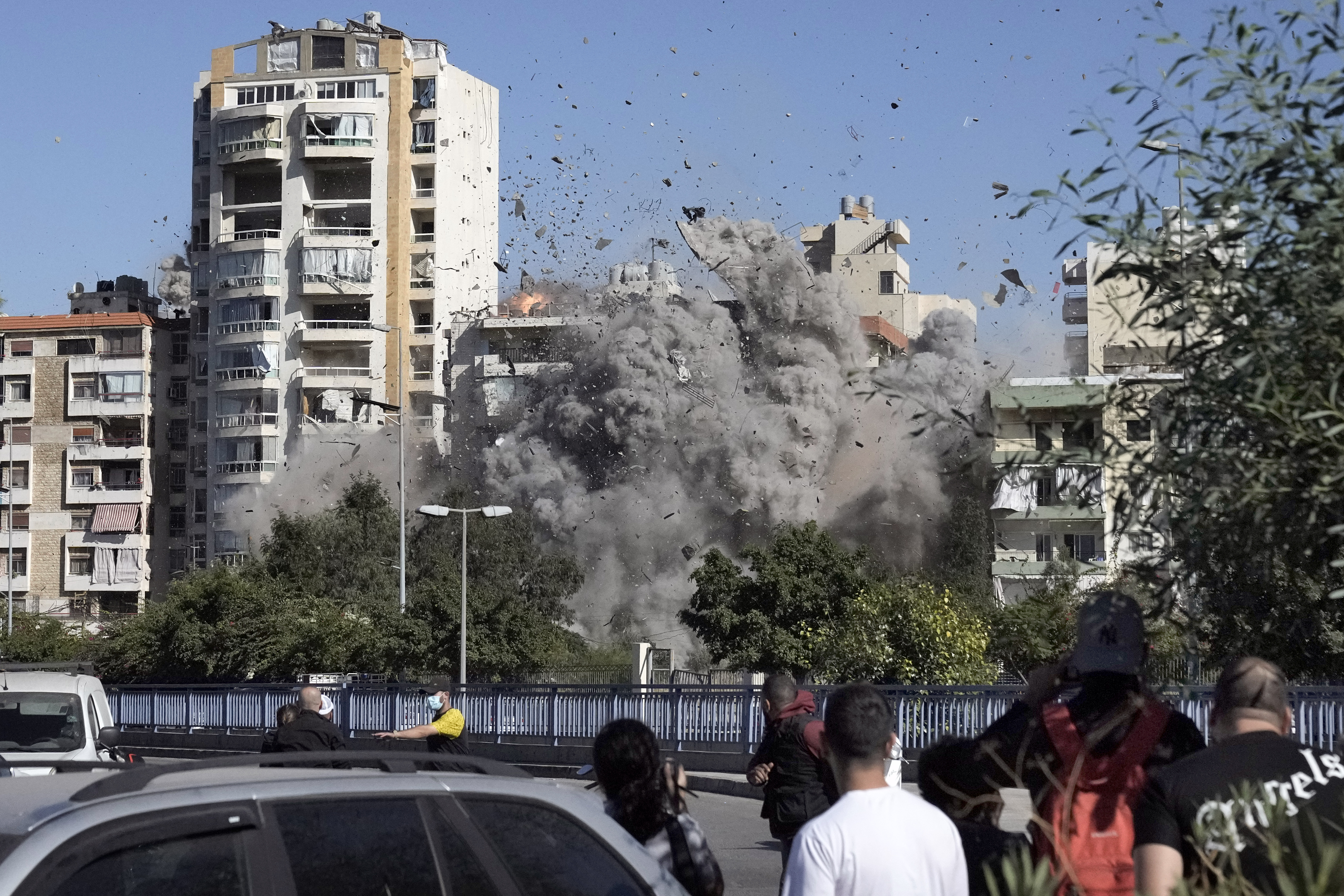 Images capture exact moments an Israeli missile strikes building in Beirut