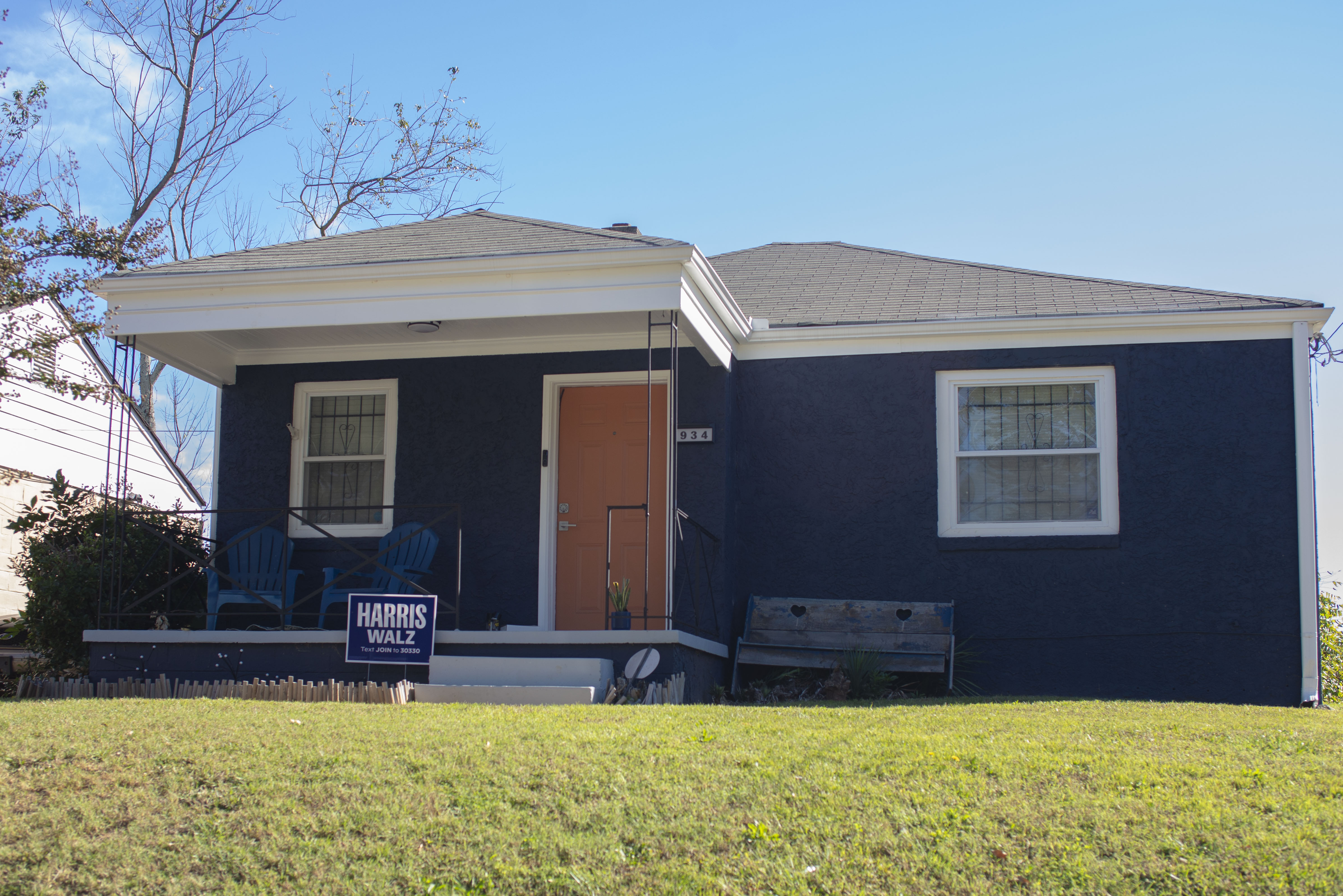 A Harris-Walz sign in seen in front of a house with matching colours in Pittsburgh neighbourhood of Atlanta