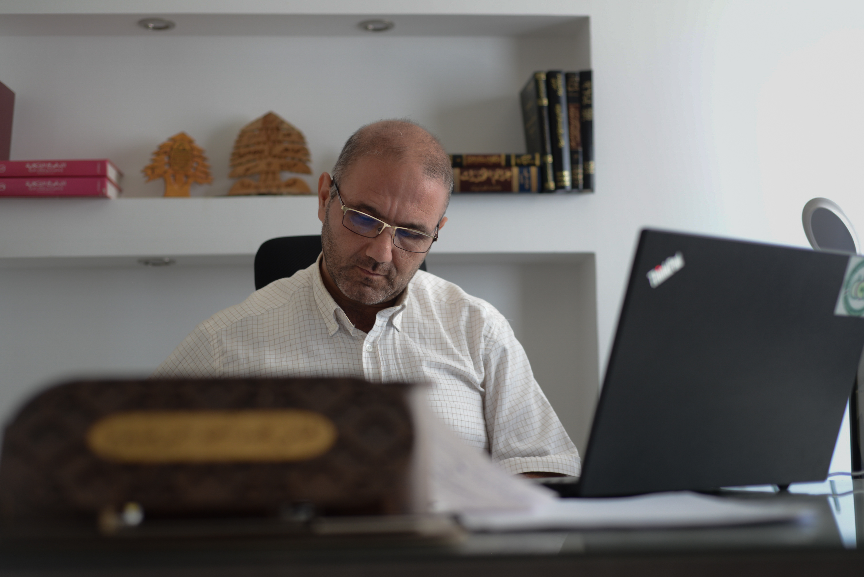 Lebanese human rights lawyer in his office