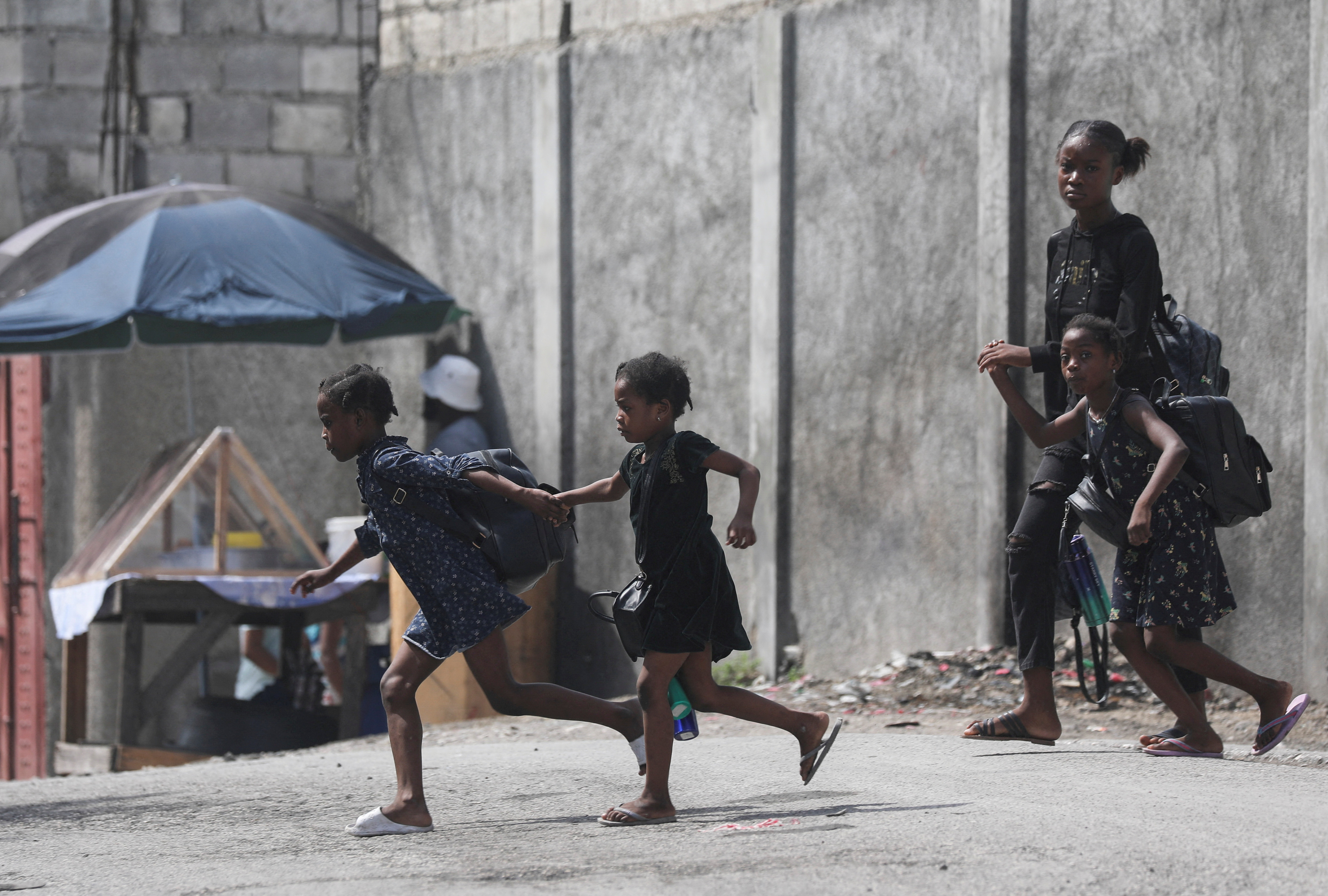 Children flee their home in Haiti amid violence