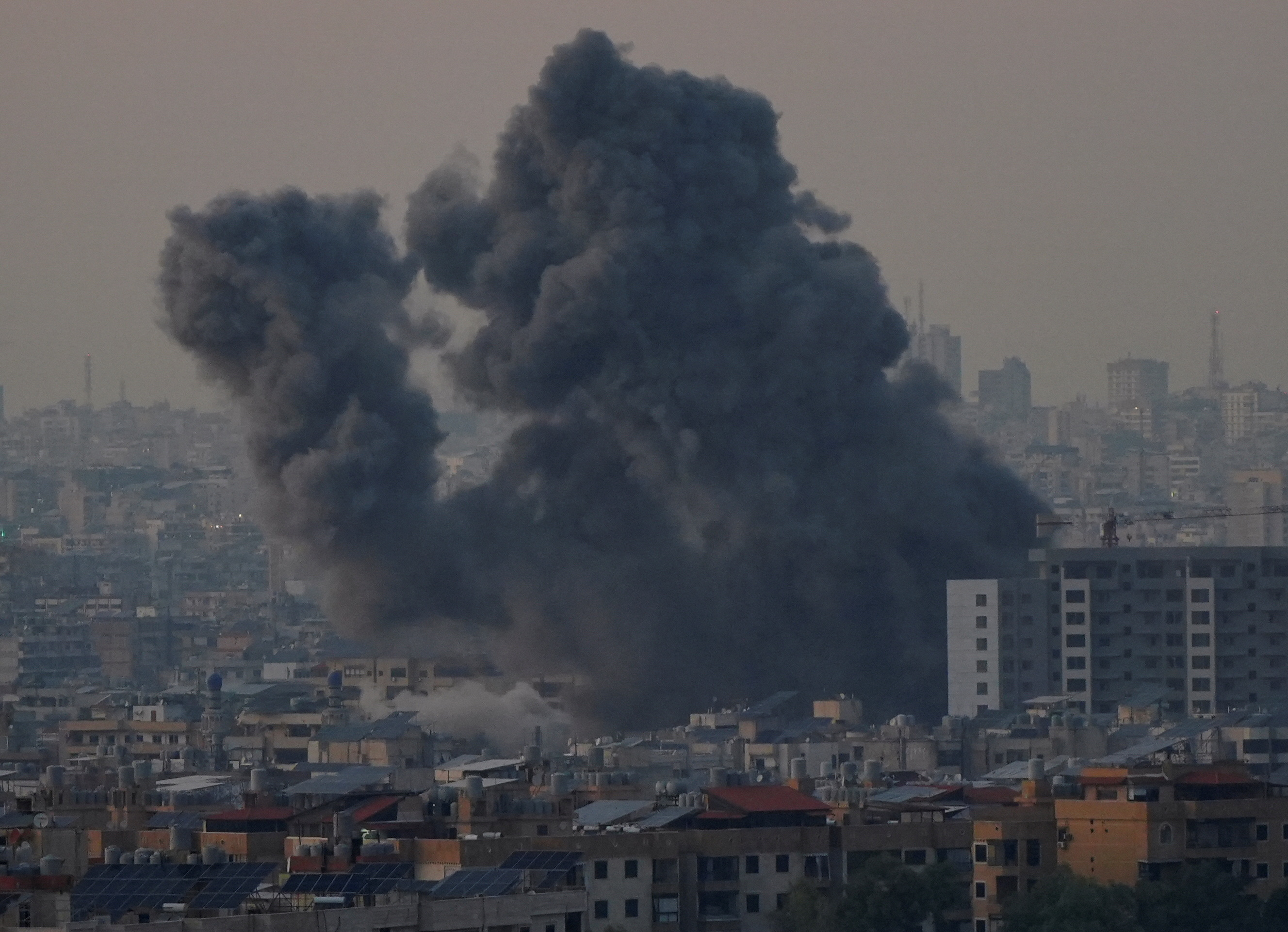 Smoke billows over Beirut's southern suburbs,
