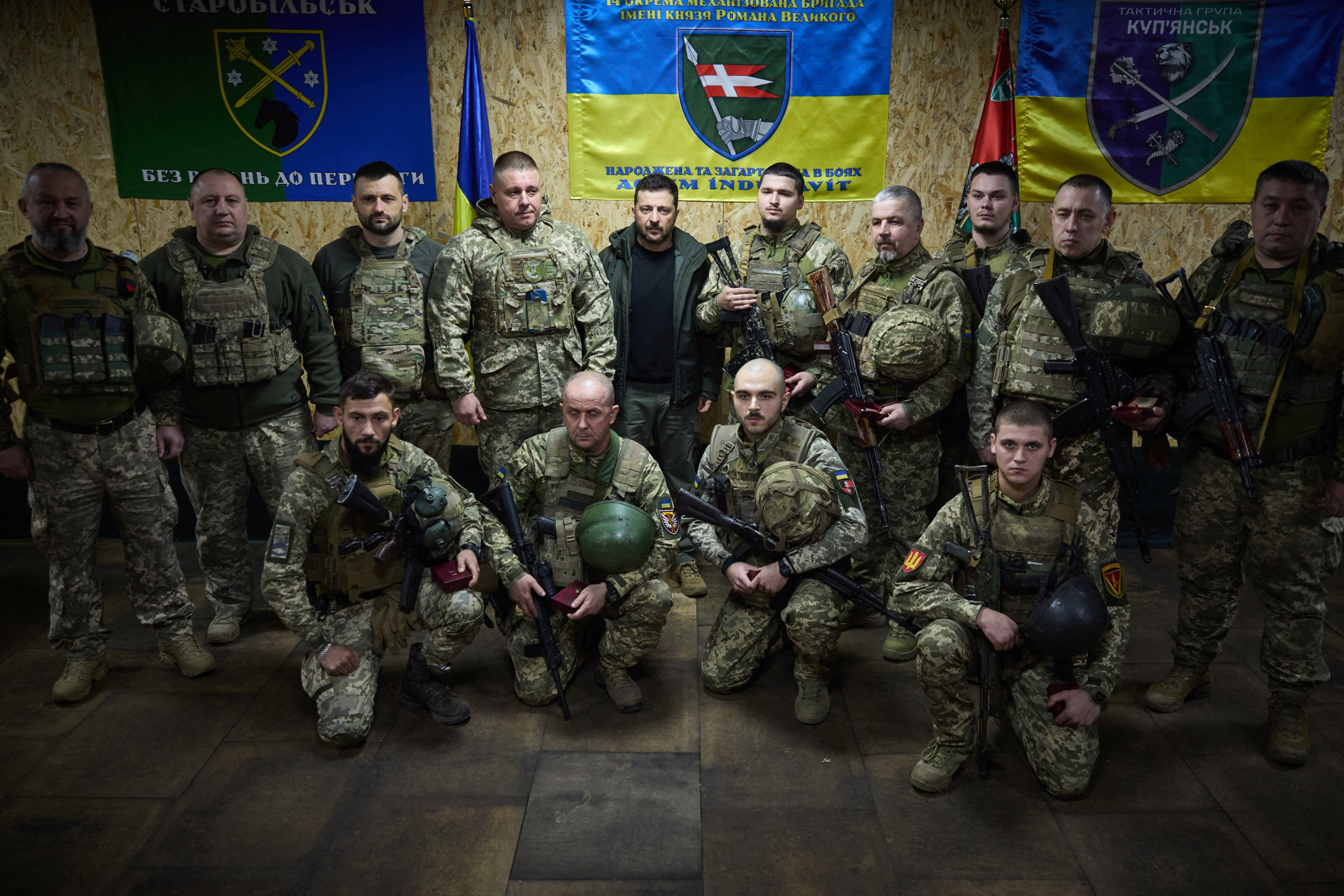 Ukraine's President Volodymyr Zelenskiy poses for a picture with Ukrainian service members during his visit to a frontline, amid Russia's attack on Ukraine, in the town of Kupiansk, Kharkiv region, Ukraine November 18, 2024. Ukrainian Presidential Press Service/Handout via REUTERS ATTENTION EDITORS - THIS IMAGE HAS BEEN SUPPLIED BY A THIRD PARTY.