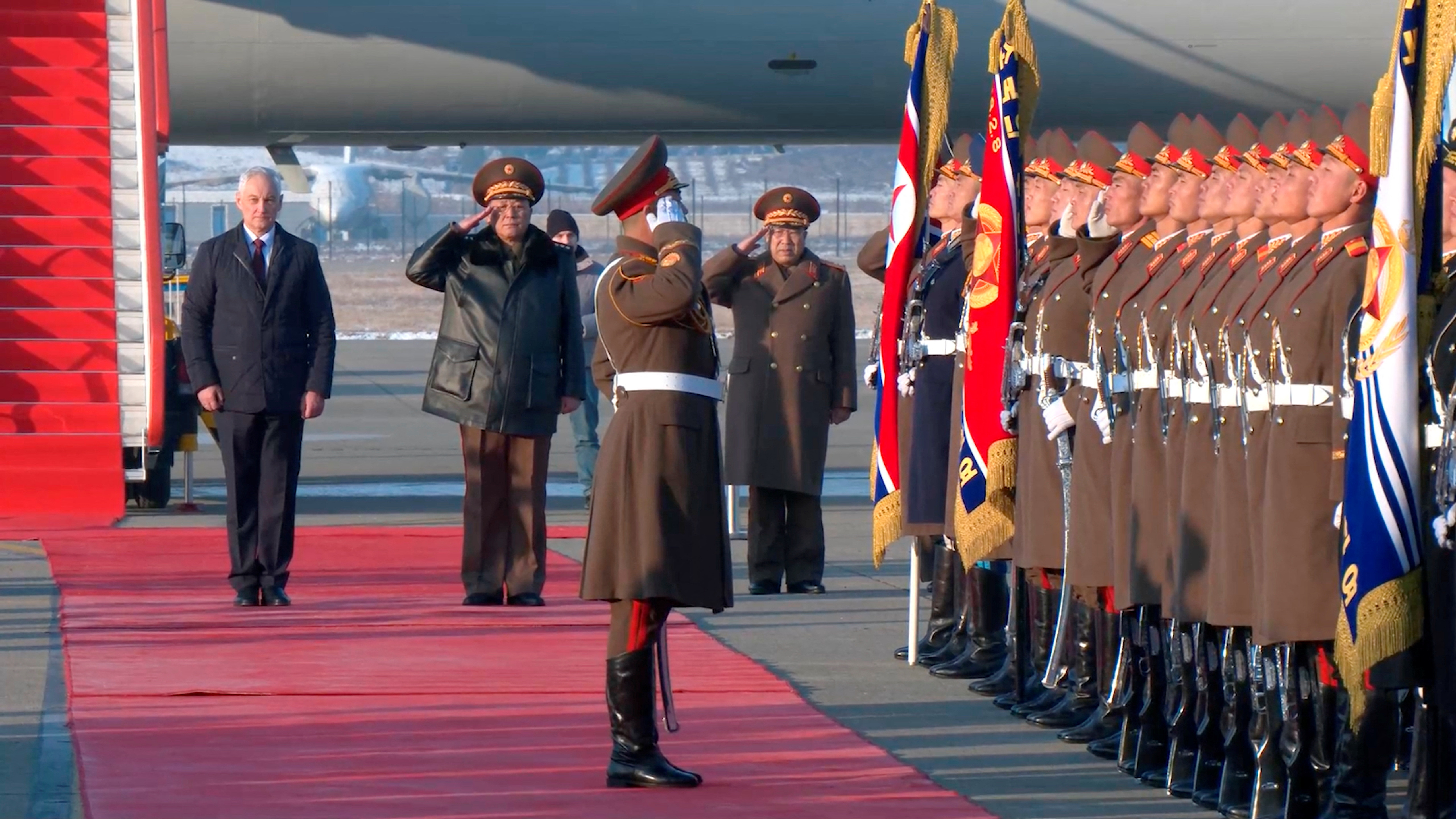 Russian Defence Minister Andrei Belousov is welcomed by North Korean Defence Minister No Kwang Chol during a ceremony upon his arrival at Pyongyang Sunan International Airport, North Korea, in this still image from video released on November 29, 2024. Russian Defence Ministry/Handout via REUTERS ATTENTION EDITORS - THIS IMAGE HAS BEEN SUPPLIED BY A THIRD PARTY. NO RESALES. NO ARCHIVES. MANDATORY CREDIT.