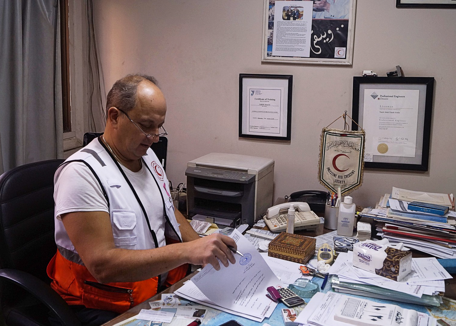 tarekarafat sitting at desk