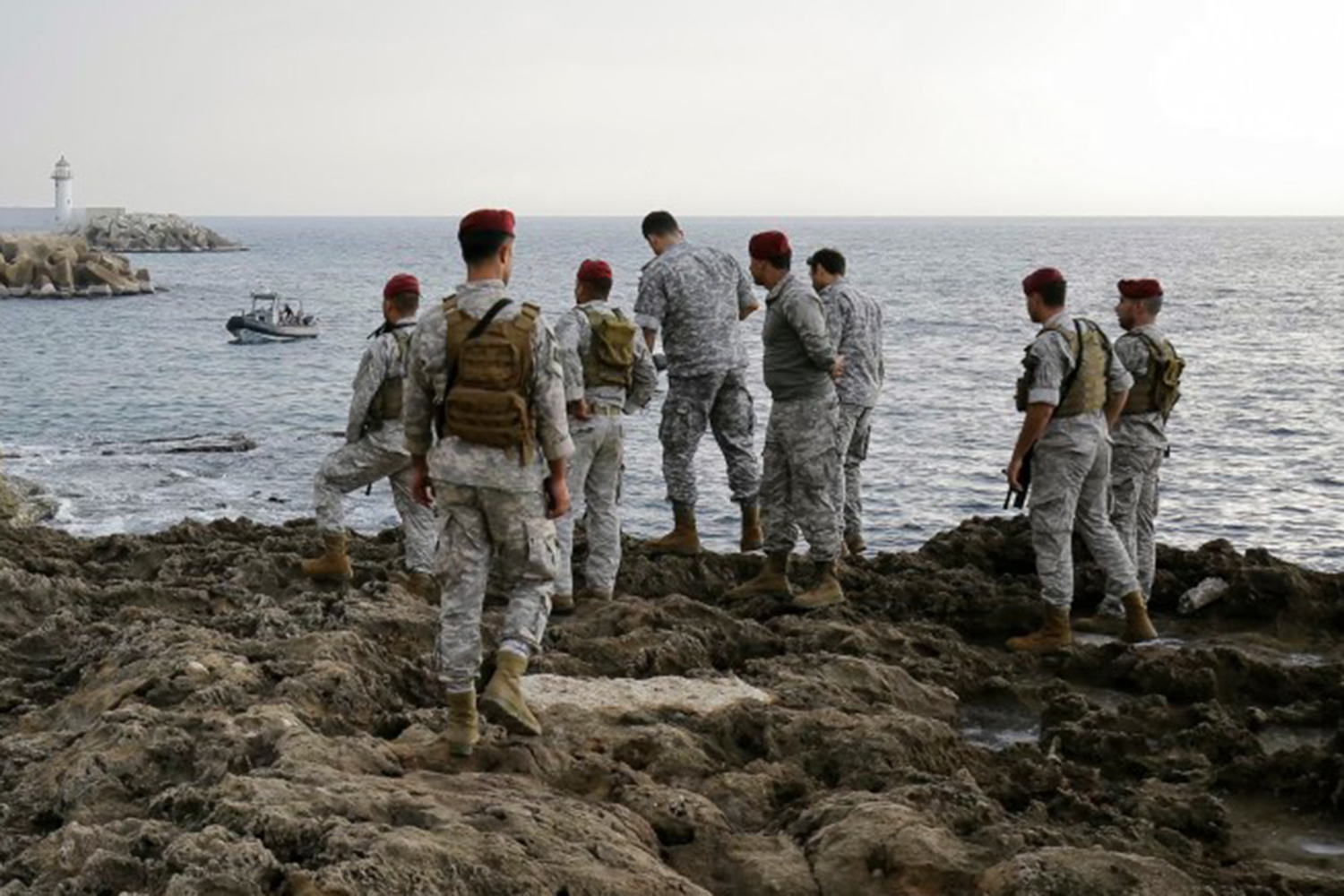 Lebanese soldiers inspect the beach